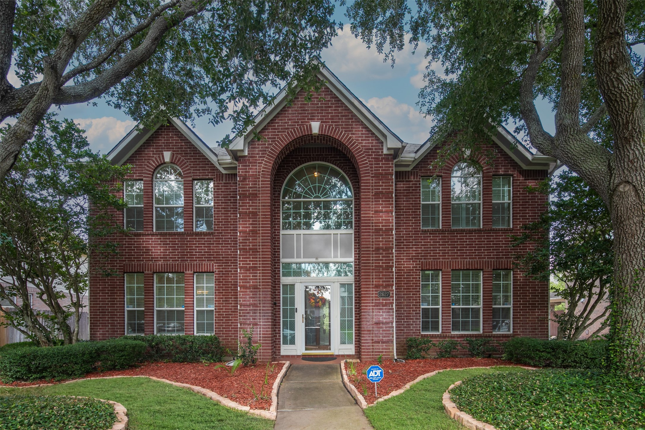 2627 Brazos Ridge Drive Sugar Land, TX 77479 - Photo 1 of 35 front view of a house with a yard