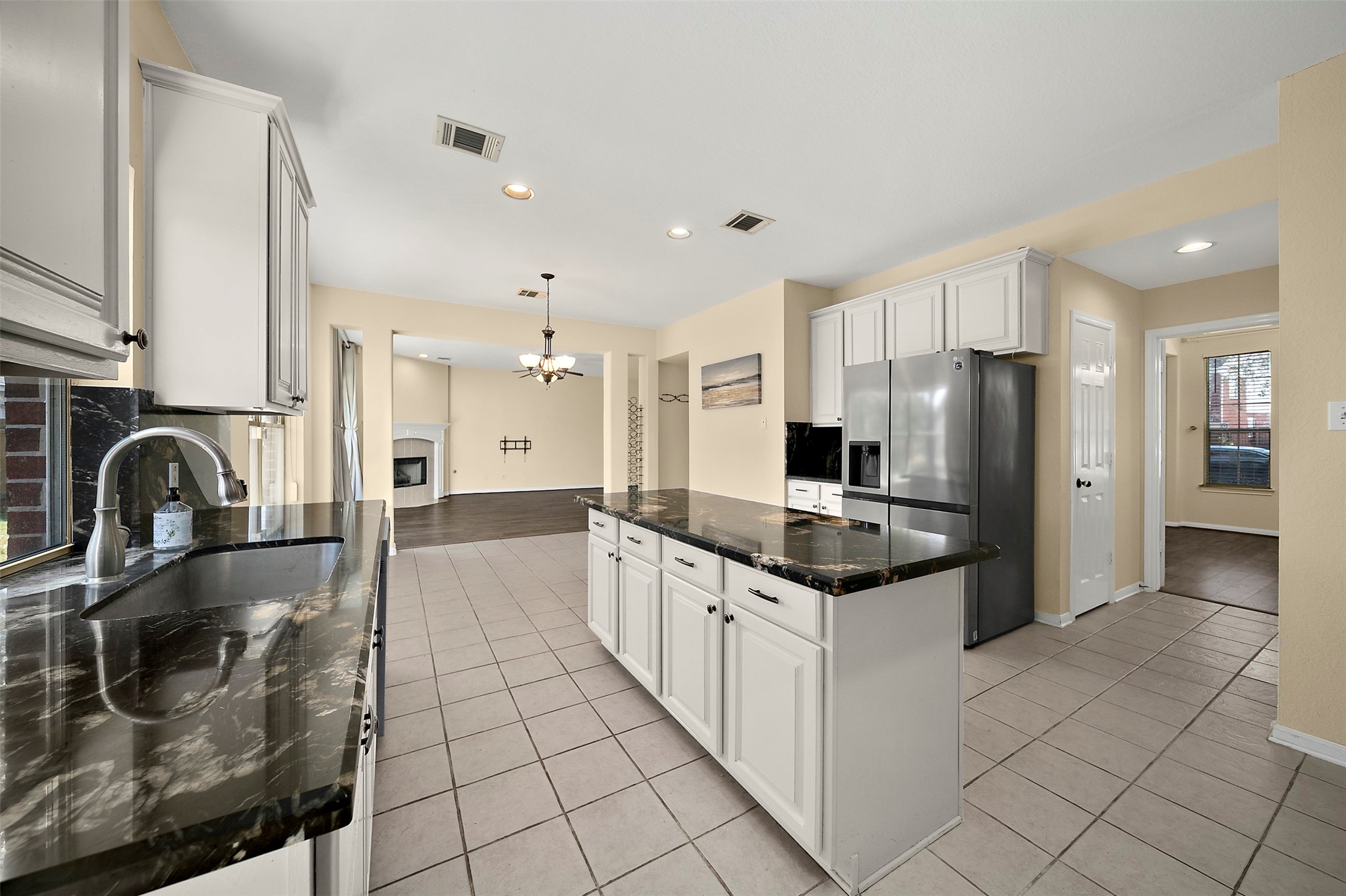 2627 Brazos Ridge Drive Sugar Land, TX 77479 - Photo 13 of 35 a kitchen with stainless steel appliances granite countertop a refrigerator and a stove top oven