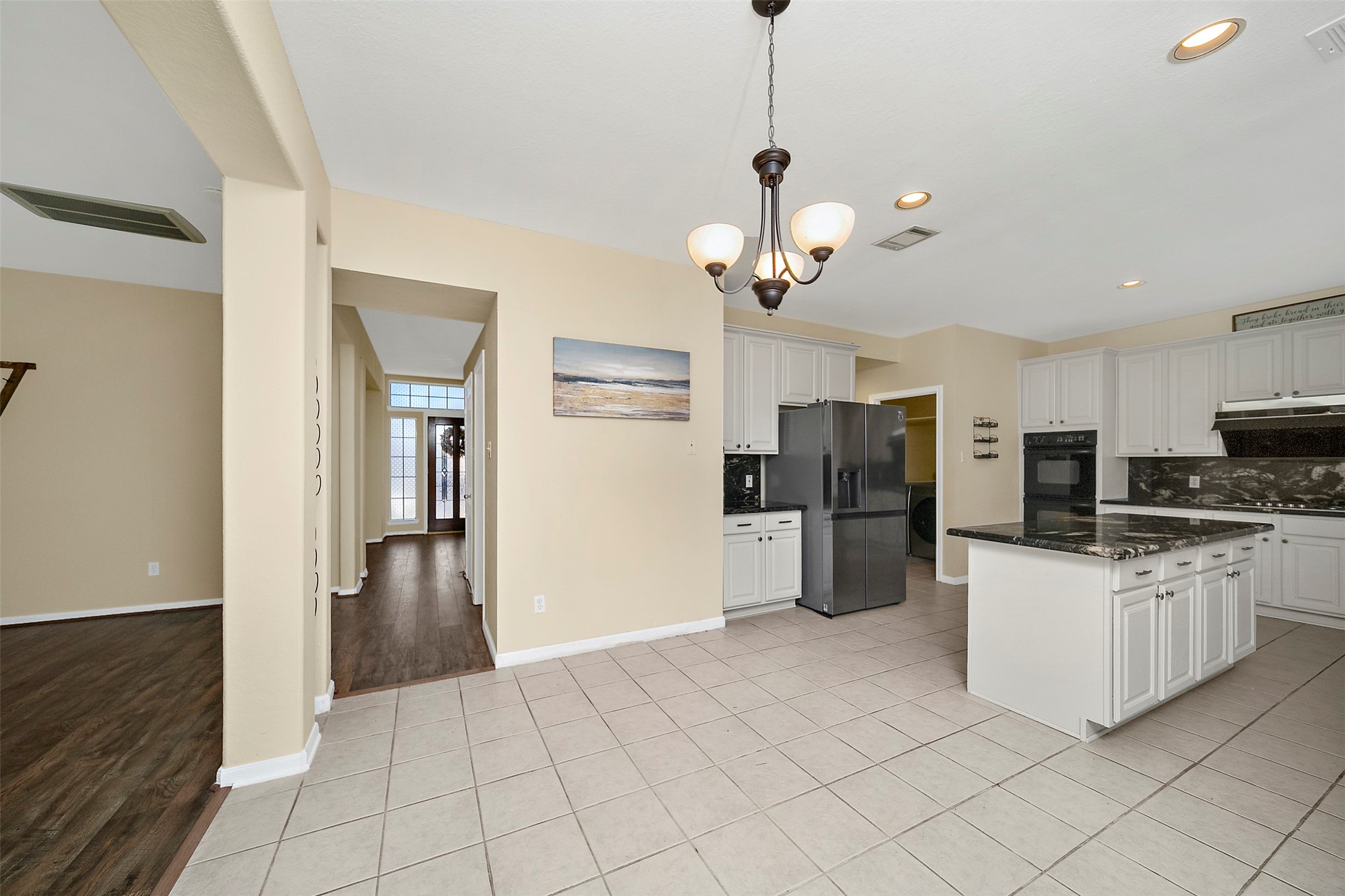 2627 Brazos Ridge Drive Sugar Land, TX 77479 - Photo 14 of 35 a kitchen with stainless steel appliances granite countertop a refrigerator and a stove top oven