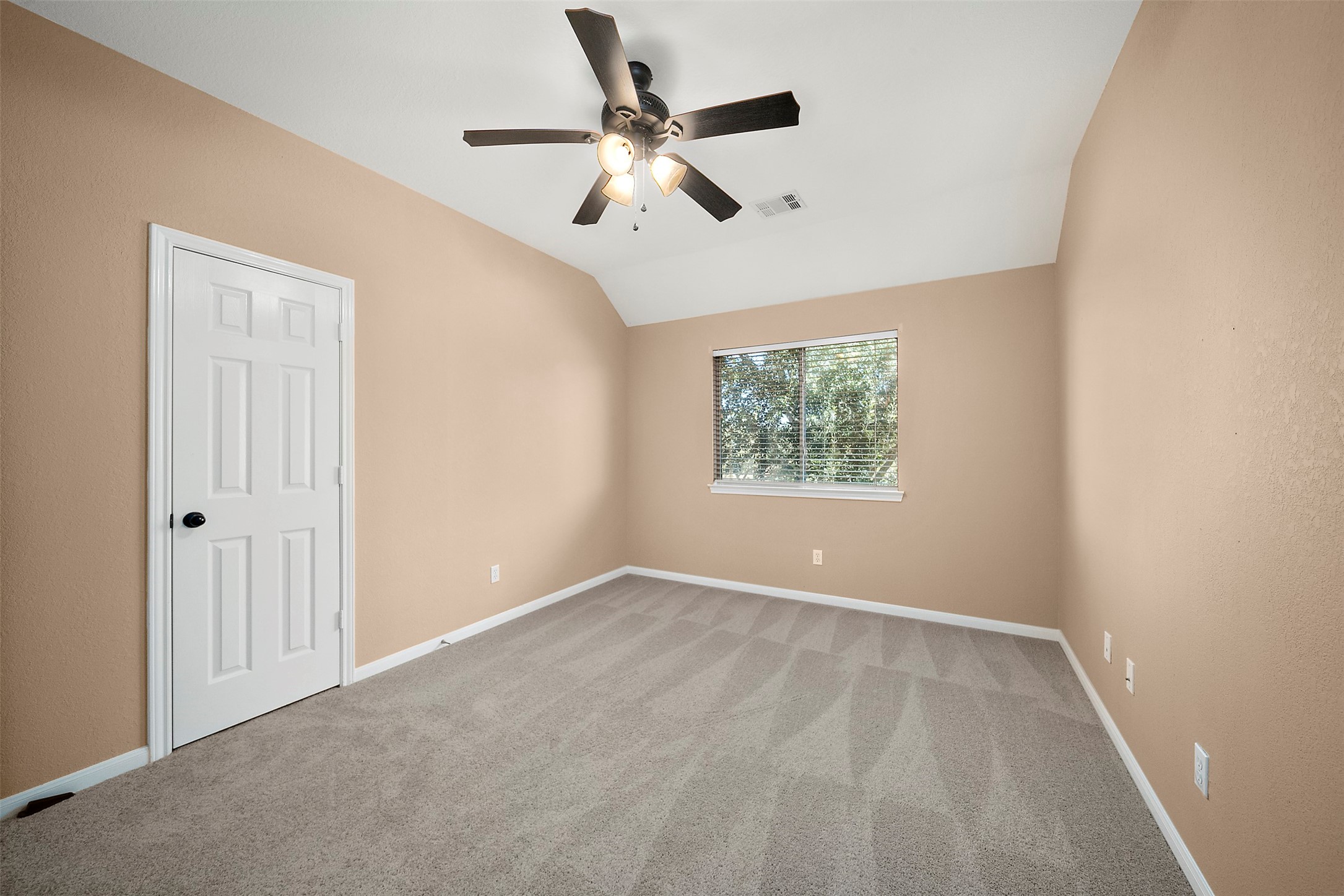 2627 Brazos Ridge Drive Sugar Land, TX 77479 - Photo 19 of 35 an empty room with ceiling fan and windows