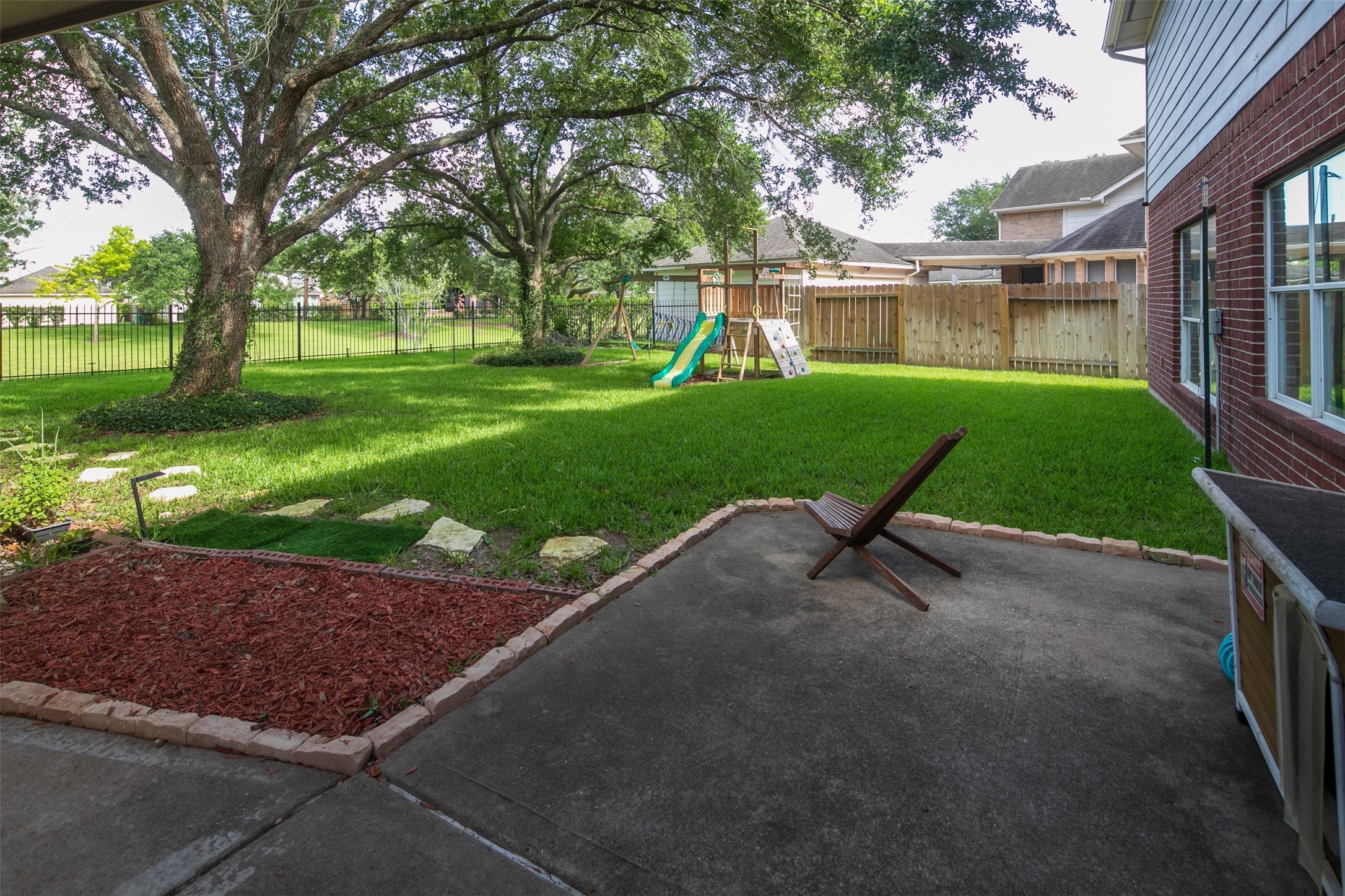 2627 Brazos Ridge Drive Sugar Land, TX 77479 - Photo 2 of 35 a view of a house with a yard and trees
