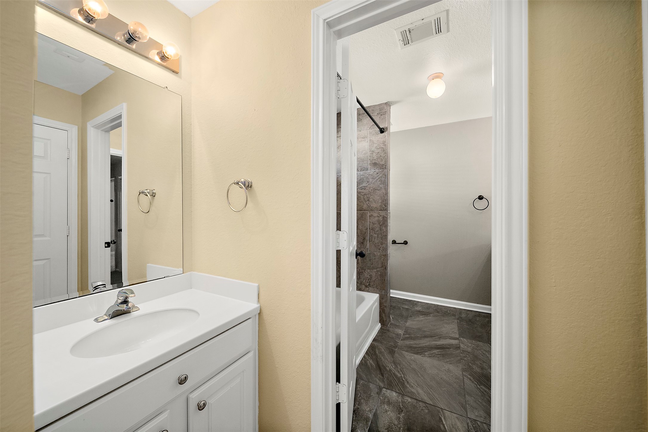 2627 Brazos Ridge Drive Sugar Land, TX 77479 - Photo 22 of 35 a bathroom with a sink and a mirror