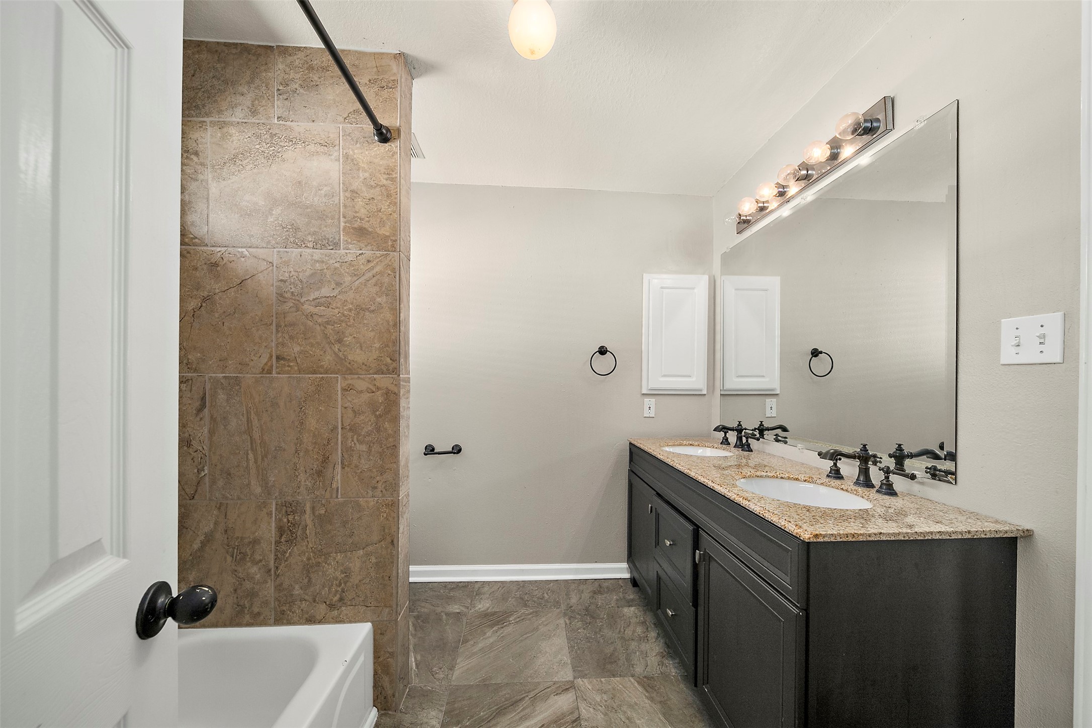 2627 Brazos Ridge Drive Sugar Land, TX 77479 - Photo 23 of 35 a bathroom with a double vanity sink mirror and shower