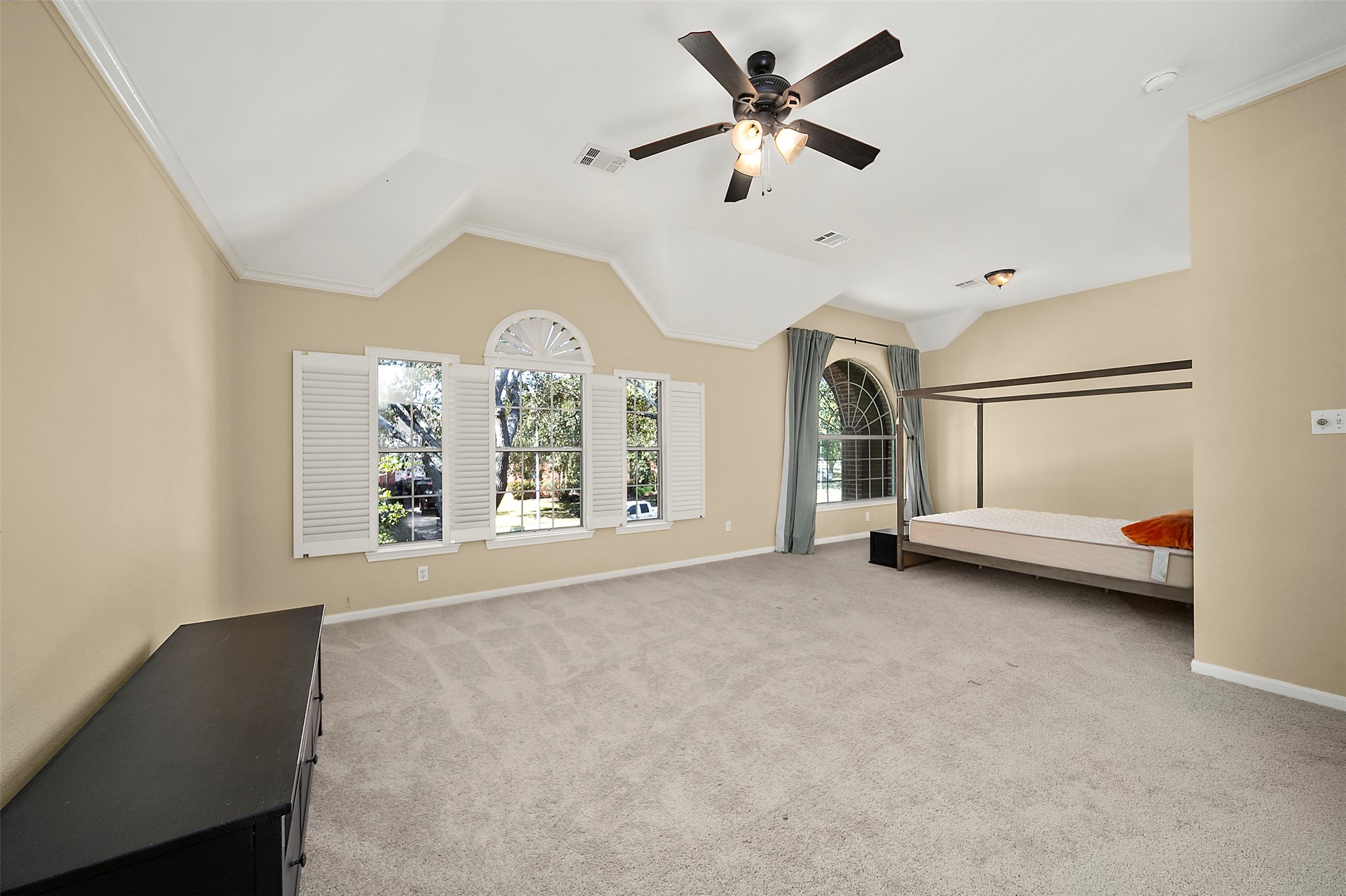 2627 Brazos Ridge Drive Sugar Land, TX 77479 - Photo 25 of 35 a view of a livingroom with a ceiling fan and window