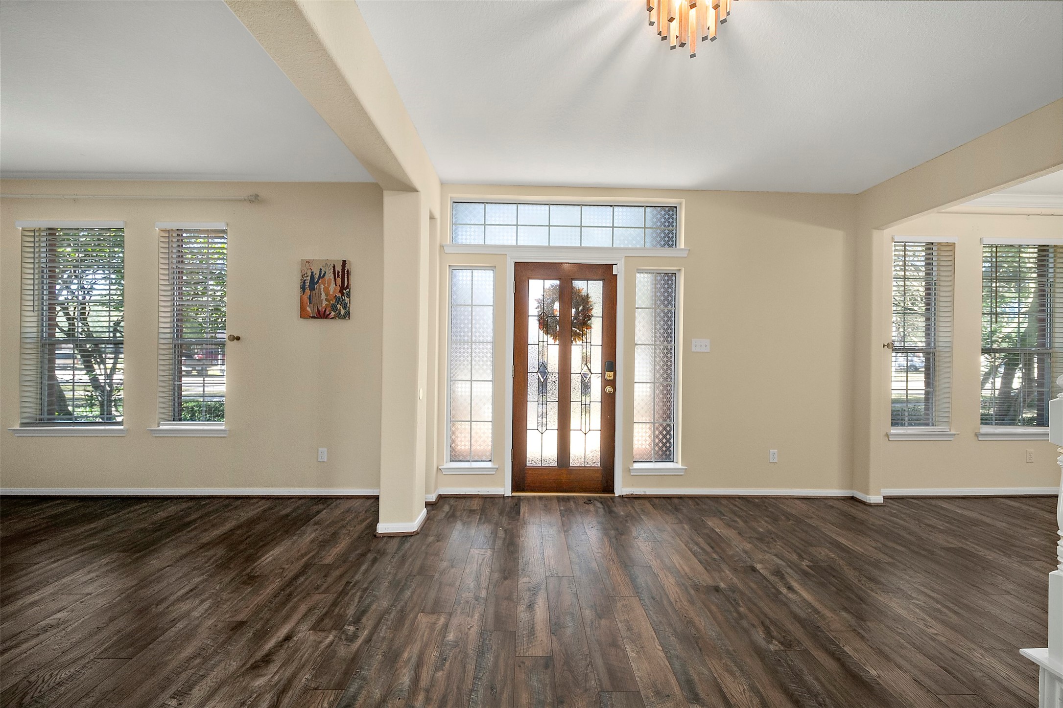 2627 Brazos Ridge Drive Sugar Land, TX 77479 - Photo 5 of 35 an empty room with wooden floor and windows