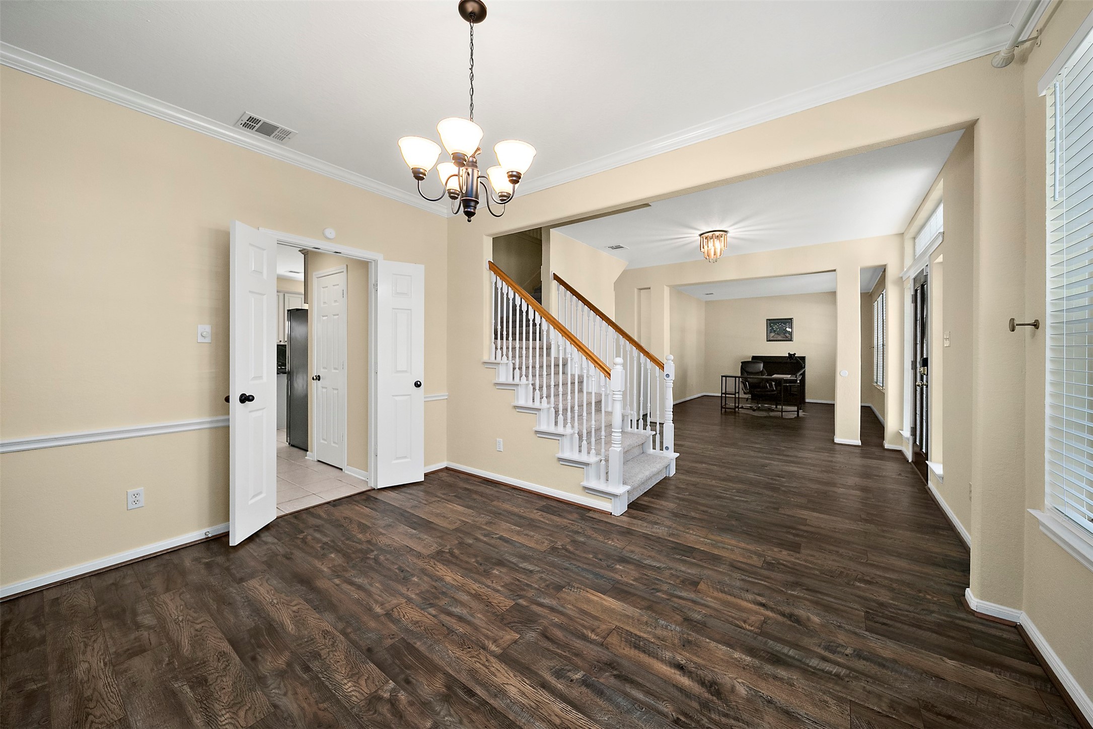 2627 Brazos Ridge Drive Sugar Land, TX 77479 - Photo 6 of 35 a view of a hallway with wooden floor and staircase