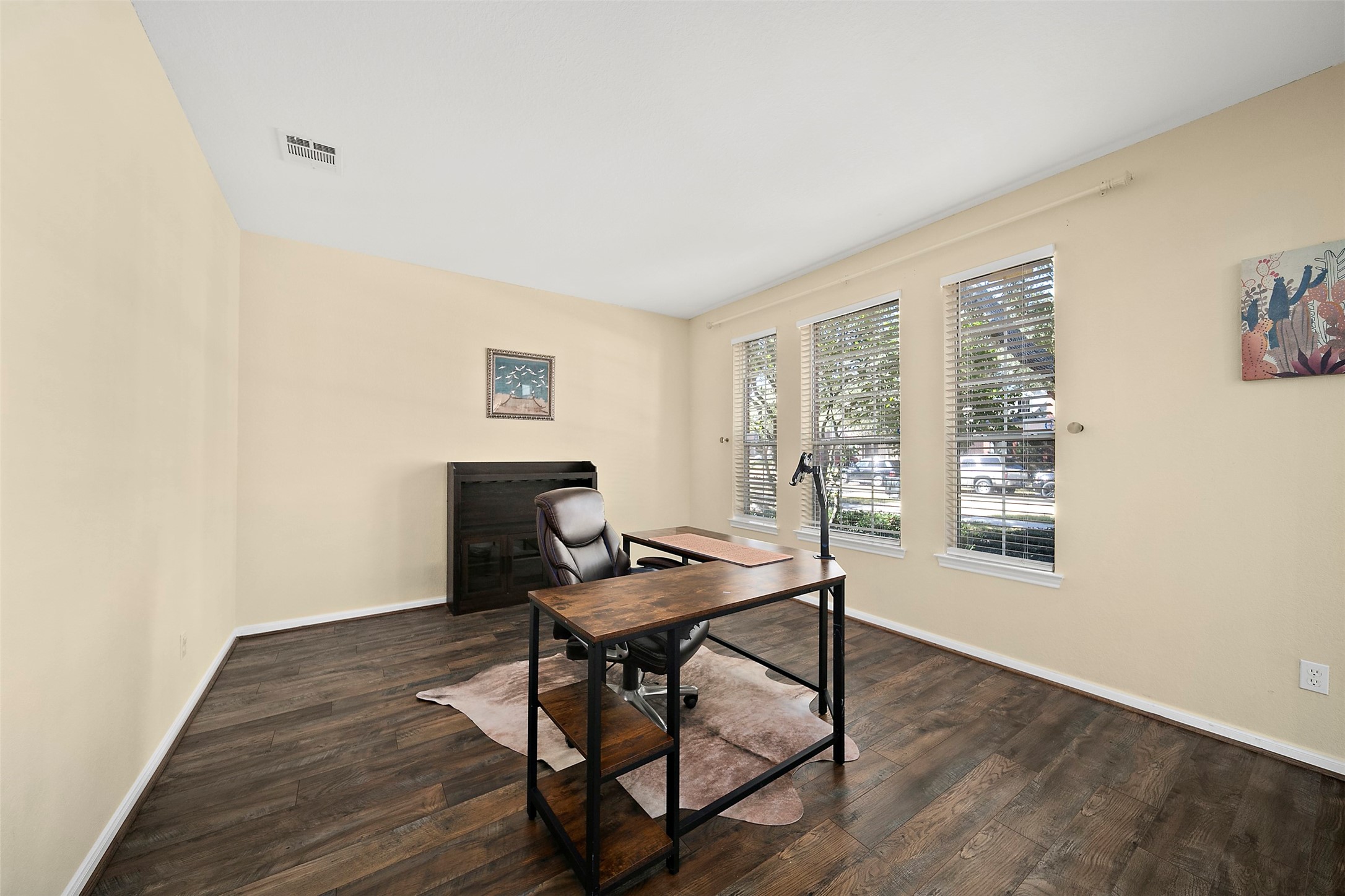 2627 Brazos Ridge Drive Sugar Land, TX 77479 - Photo 10 of 35 a workspace with wooden floor and a window