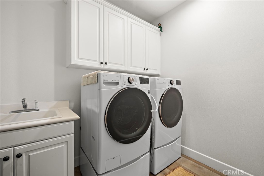 5 Drackert Lane Ladera Ranch, CA 92694 - Photo 27 of 57 Spacious Laundryroom w/sink & storage cabinets