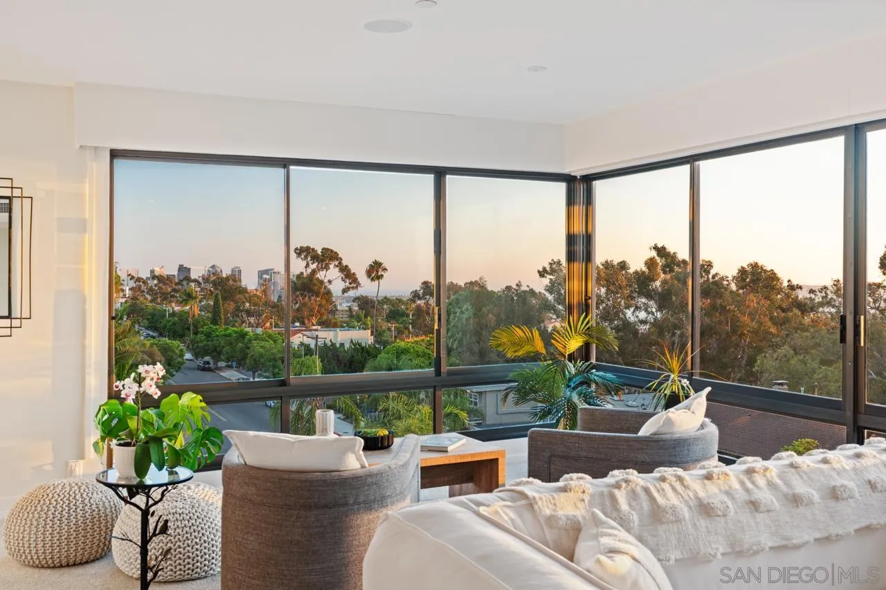 3161 1st Avenue, Unit 3S San Diego, CA 92103 - Photo 11 of 48 a living room with furniture and a large window
