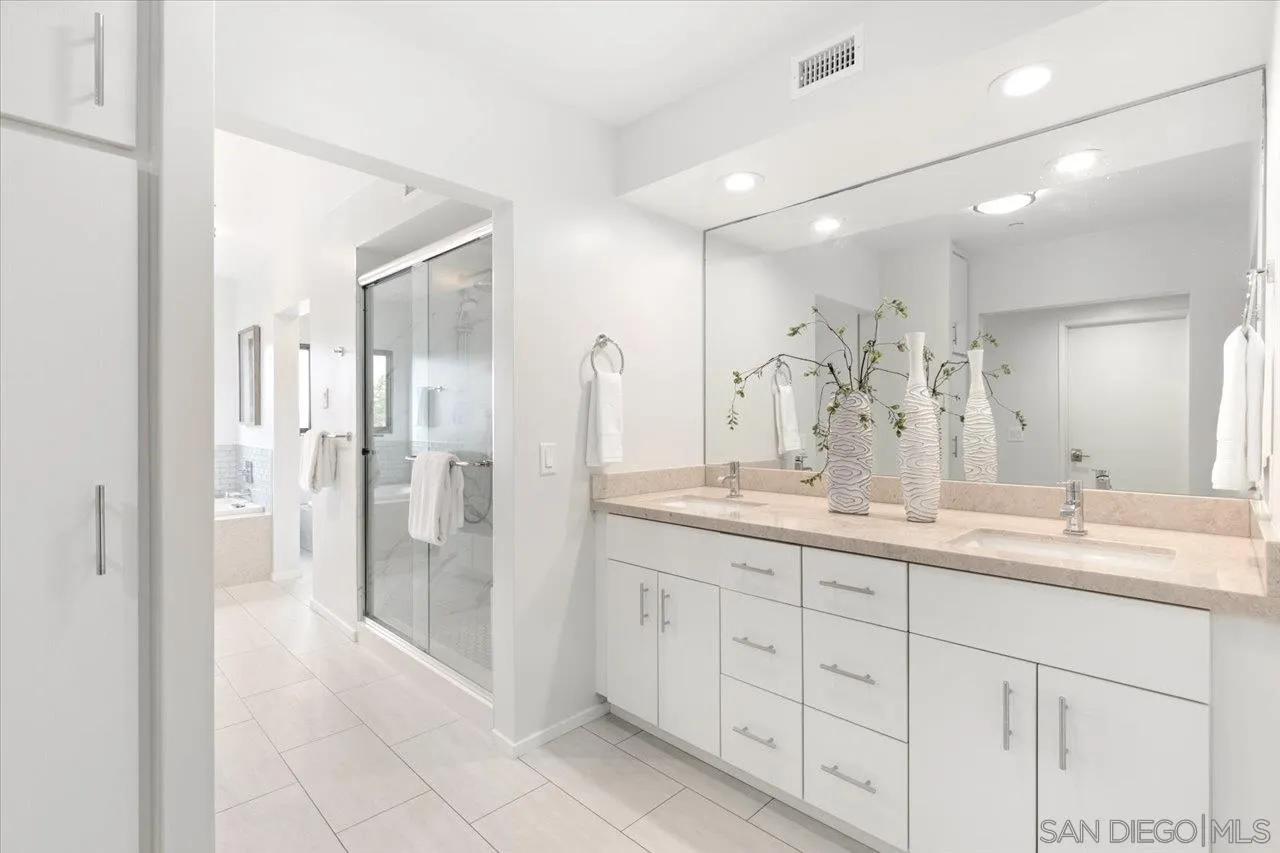 3161 1st Avenue, Unit 3S San Diego, CA 92103 - Photo 24 of 48 a bathroom with a double vanity sink mirror and double