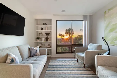 a kitchen with a refrigerator and a stove