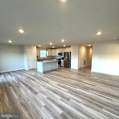 a view of a kitchen with a sink