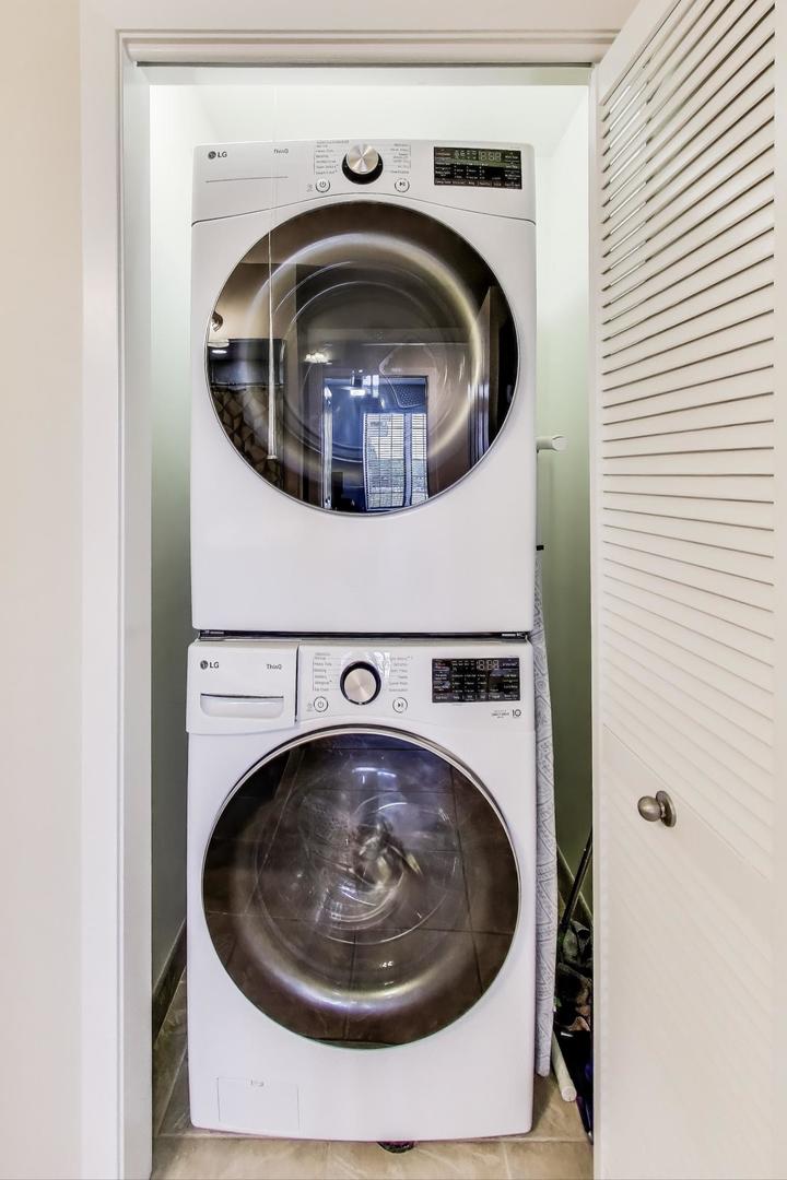 100 South Emerson Street, Unit 415 Mount Prospect, IL 60056 - Photo 12 of 15 a utility room with dryer and washer