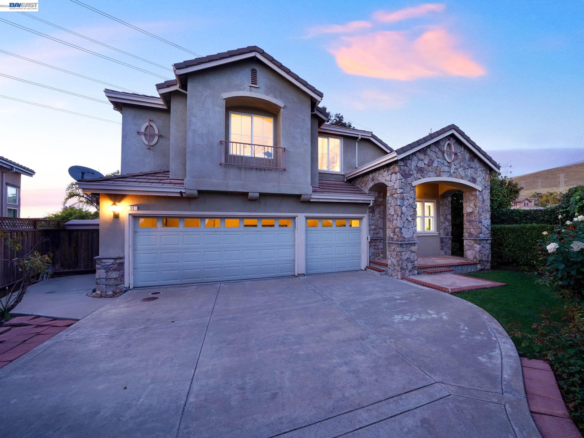 11 Meadows Court Fremont, CA 94539 - Photo 2 of 69 a front view of a house with a yard