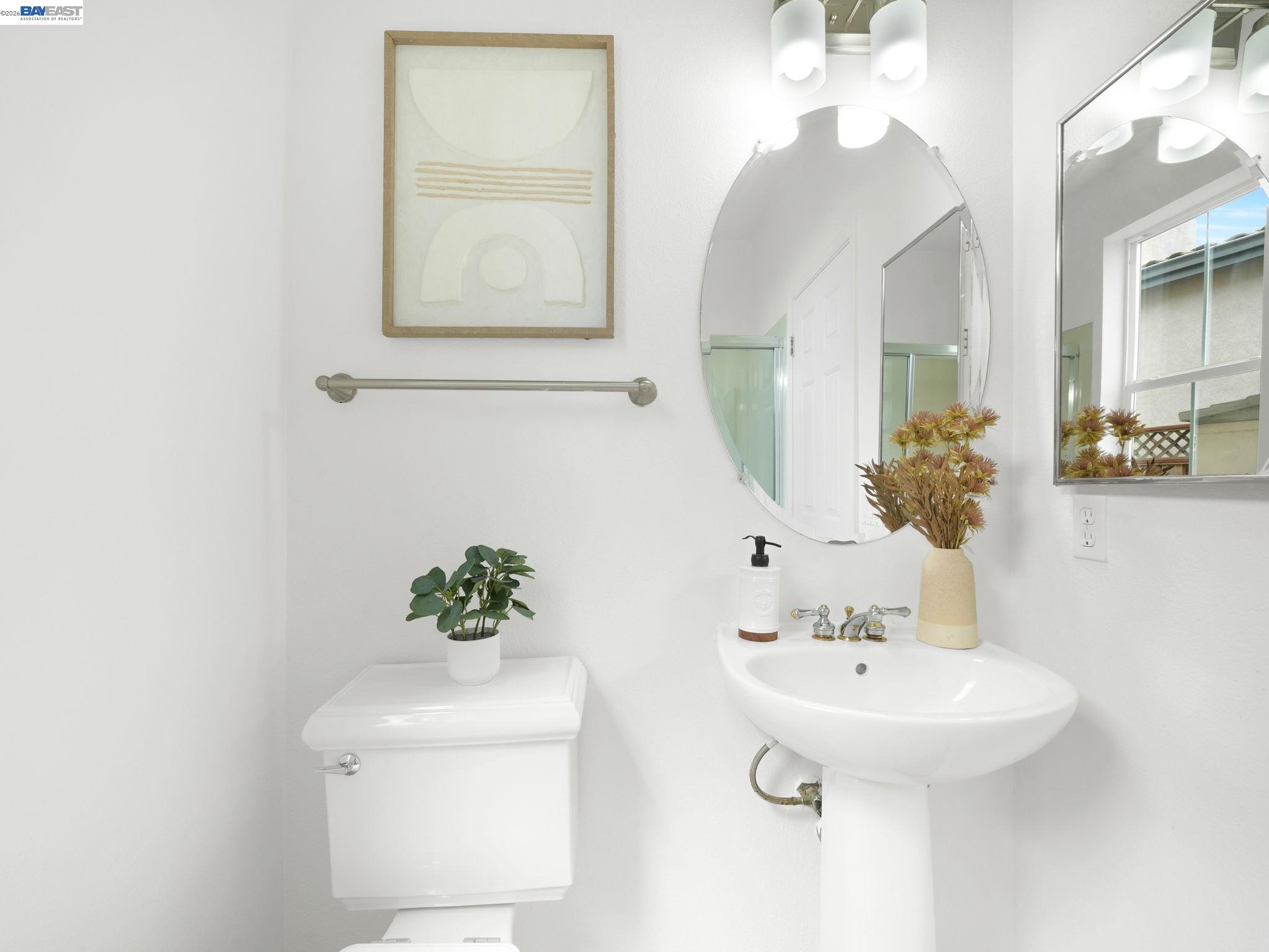 11 Meadows Court Fremont, CA 94539 - Photo 22 of 69 a bathroom with a sink and a mirror