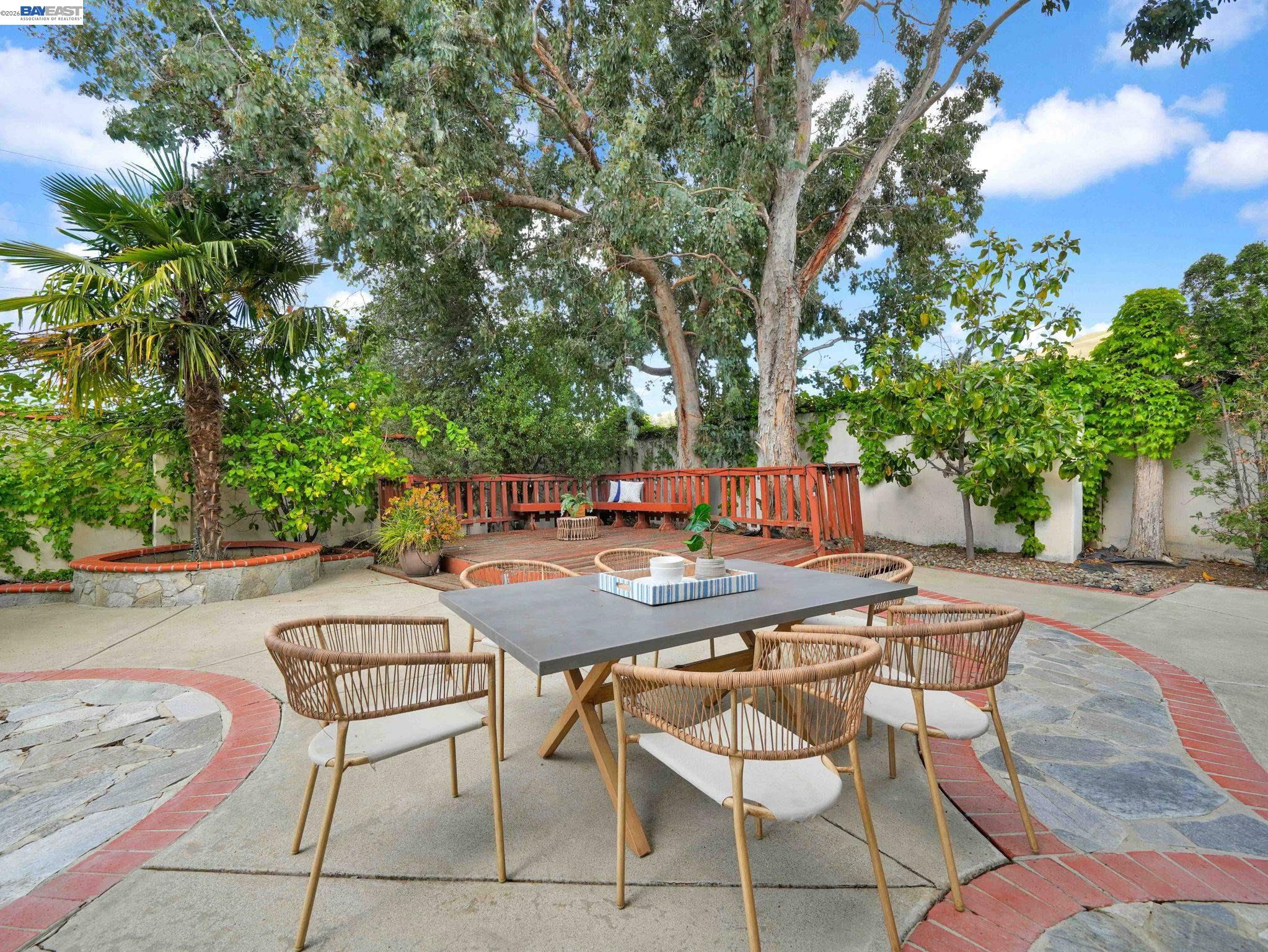 11 Meadows Court Fremont, CA 94539 - Photo 39 of 69 a view of a patio with table and chairs and potted plants