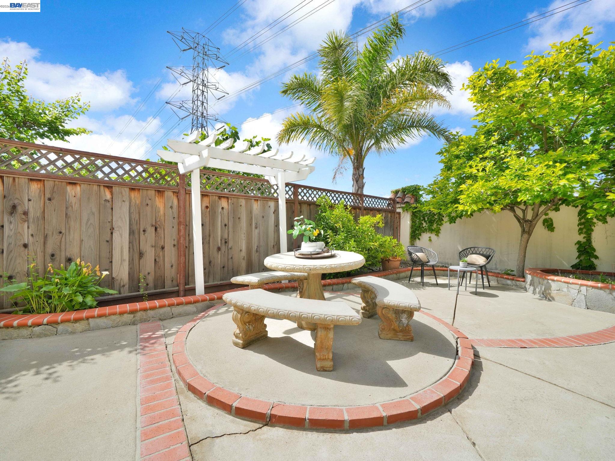 11 Meadows Court Fremont, CA 94539 - Photo 43 of 69 a view of a tables and chairs in patio