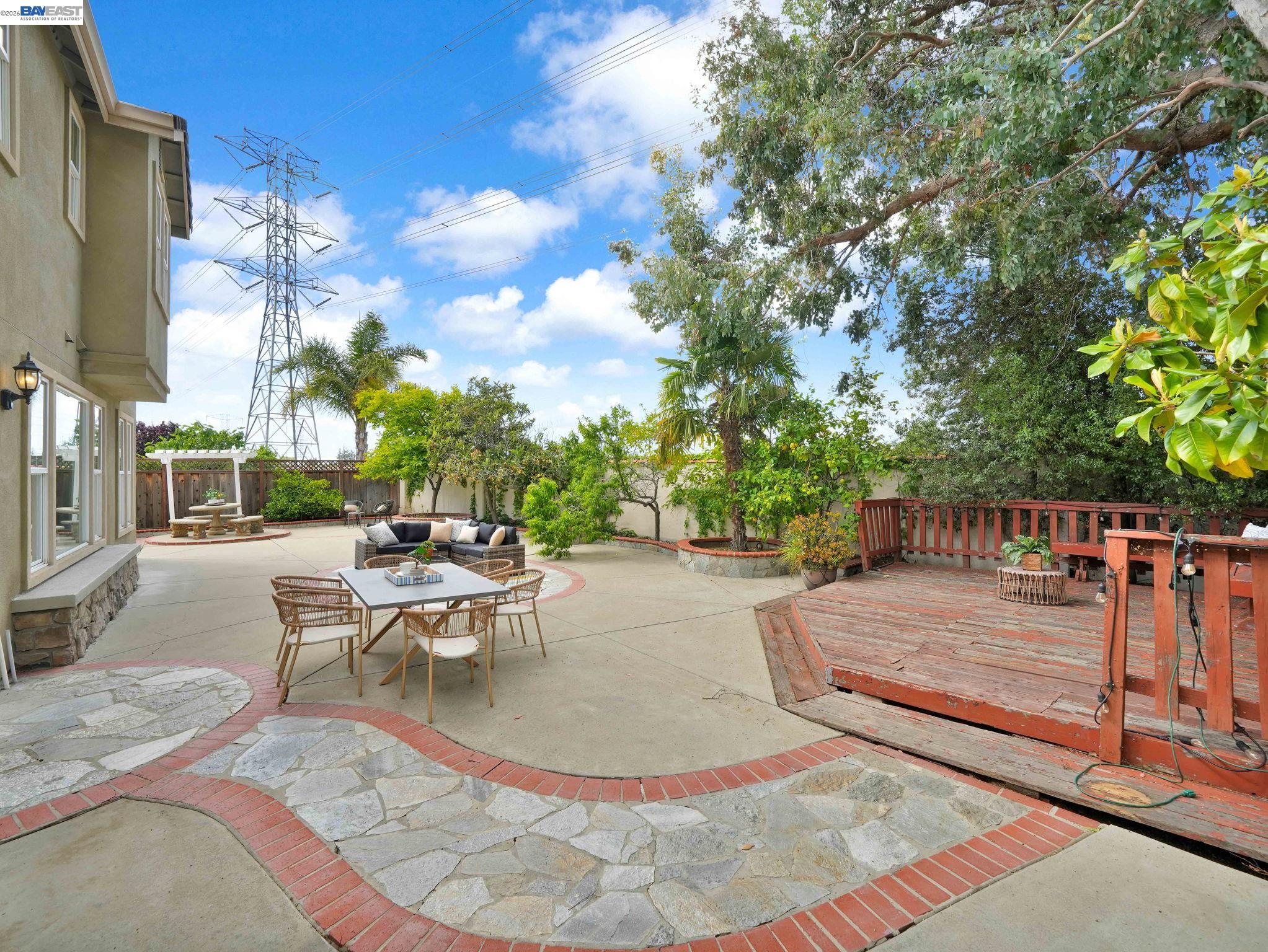 11 Meadows Court Fremont, CA 94539 - Photo 44 of 69 a view of a patio with a table and chairs