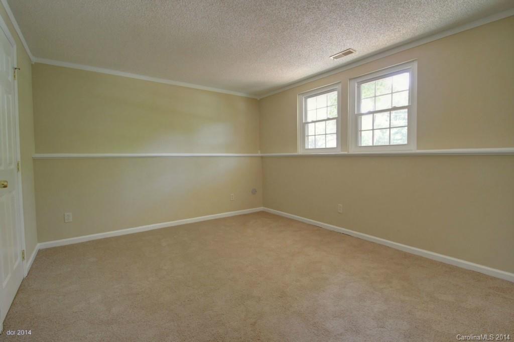 6625 Reddman Road Charlotte, NC 28212 - Photo 16 of 24 an empty room with a window
