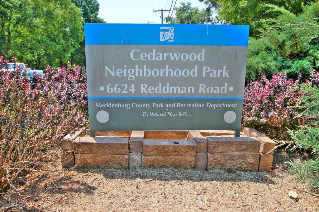 6625 Reddman Road Charlotte, NC 28212 - Photo 20 of 24 a sign on the side of a building
