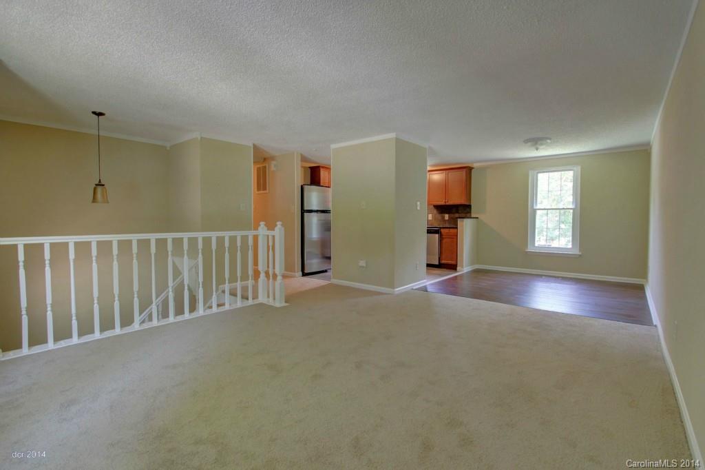 6625 Reddman Road Charlotte, NC 28212 - Photo 8 of 24 a view of a livingroom with a staircase