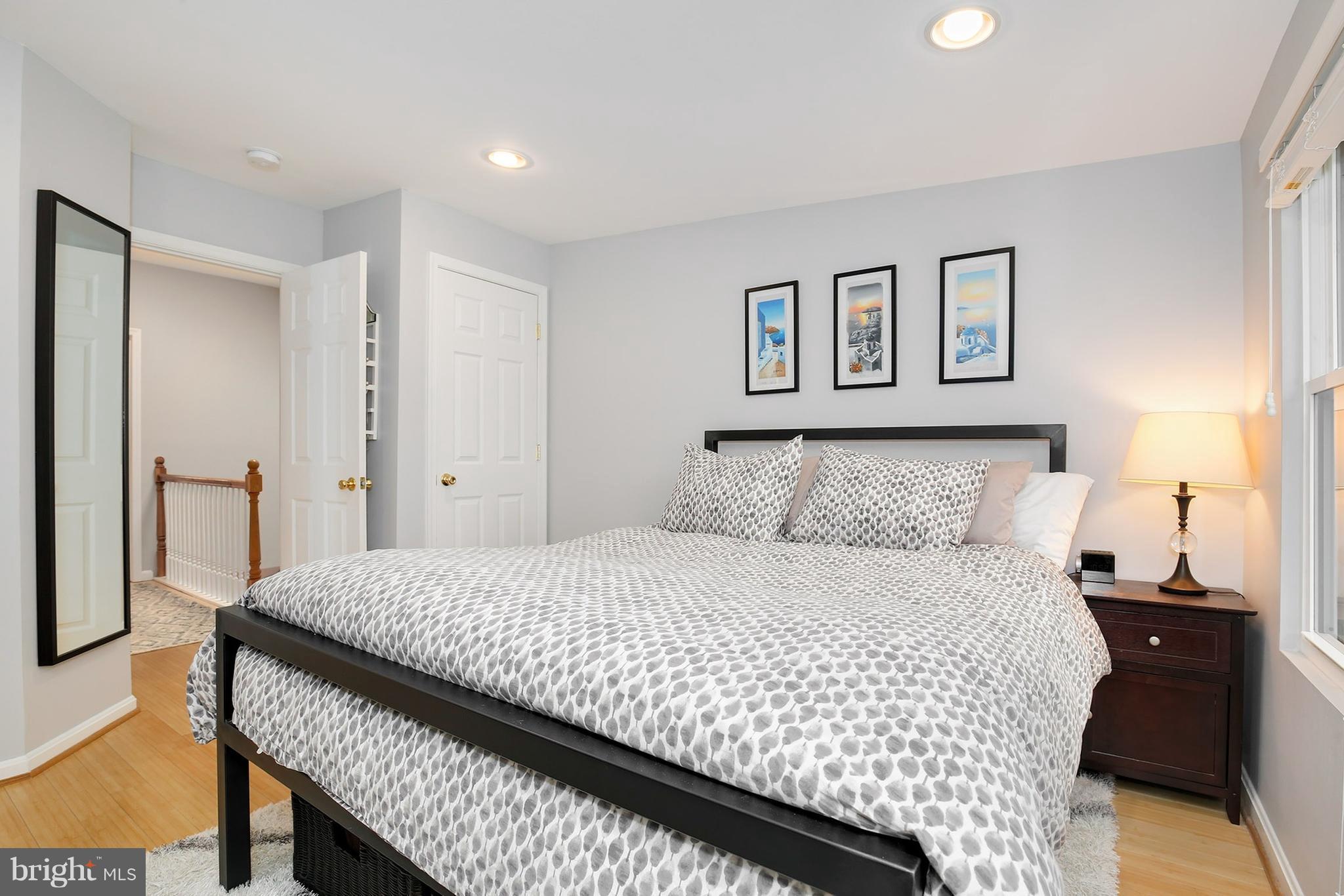 714 19th Street Northeast Washington, DC 20002 - Photo 20 of 27 a bedroom with a bed and a night stand