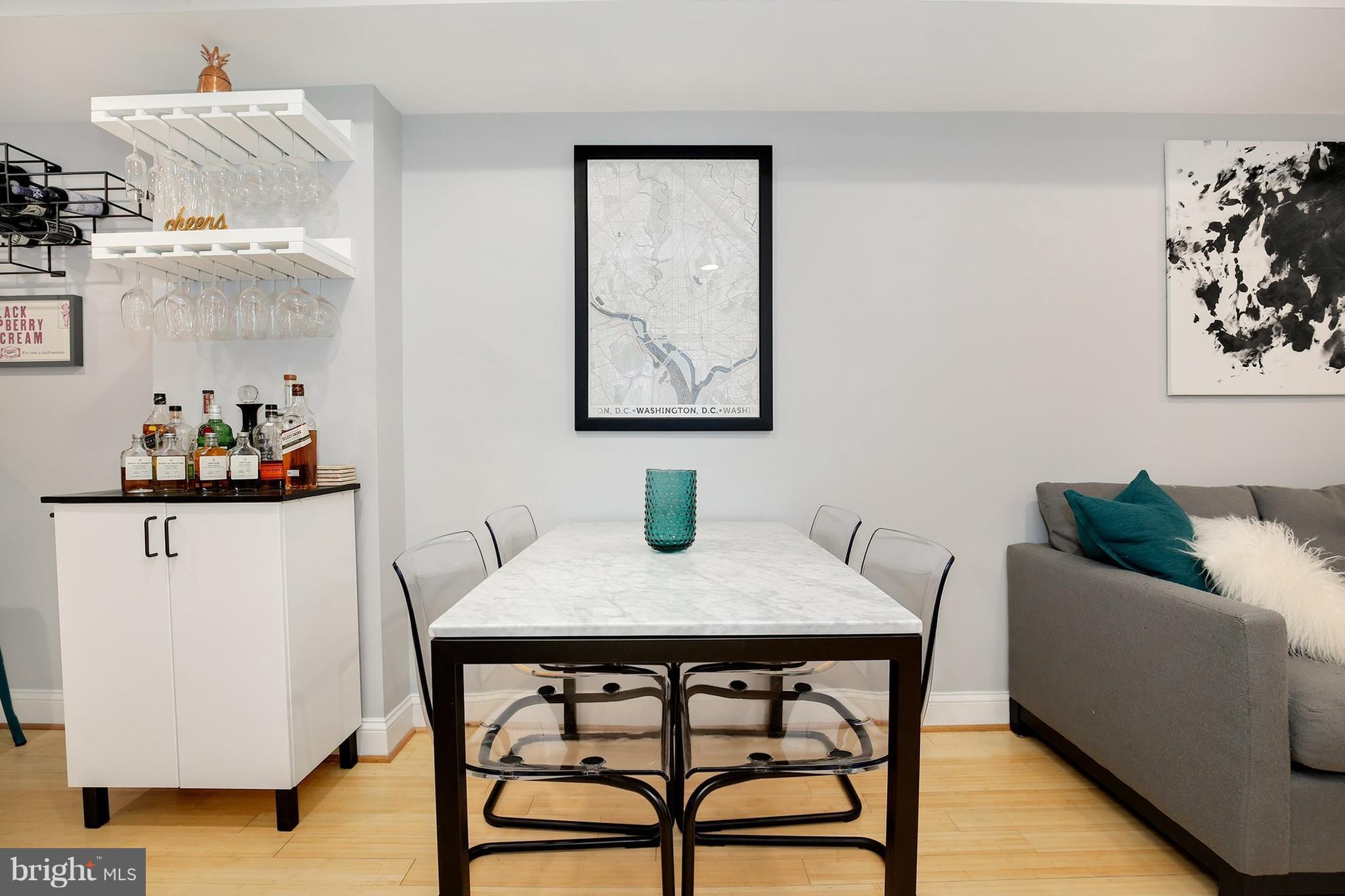 714 19th Street Northeast Washington, DC 20002 - Photo 9 of 27 a view of a dining room with furniture and wooden floor