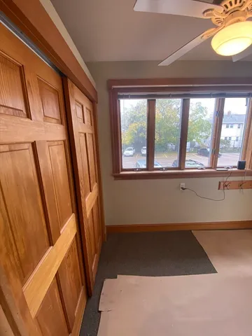 a view of an empty room and window