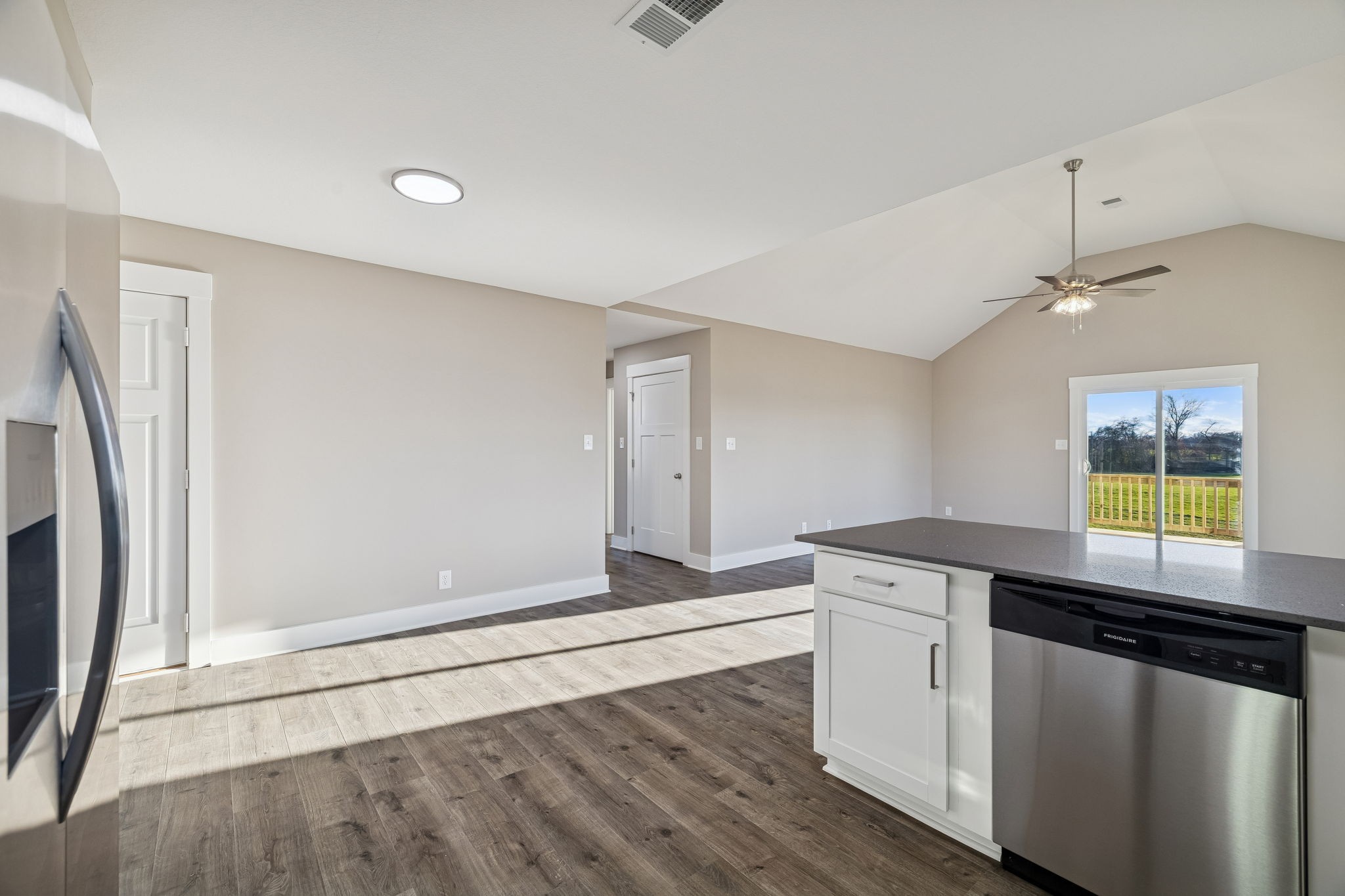 357 Hugh Hunter Road Oak Grove, KY 42262 - Photo 13 of 43 a kitchen with stainless steel appliances granite countertop a sink and a refrigerator