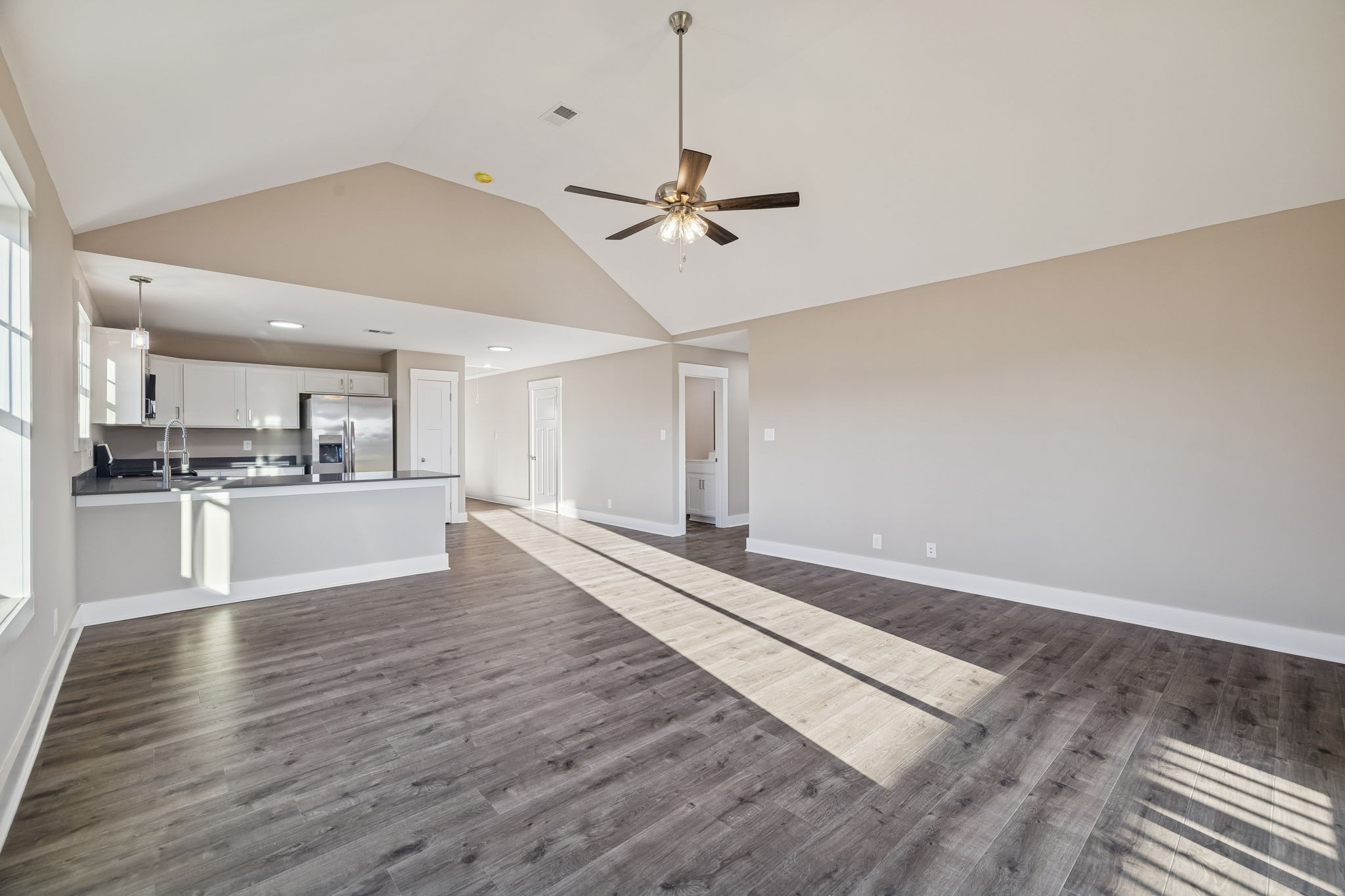 357 Hugh Hunter Road Oak Grove, KY 42262 - Photo 16 of 43 a view of a kitchen with wooden floor and a kitchen space
