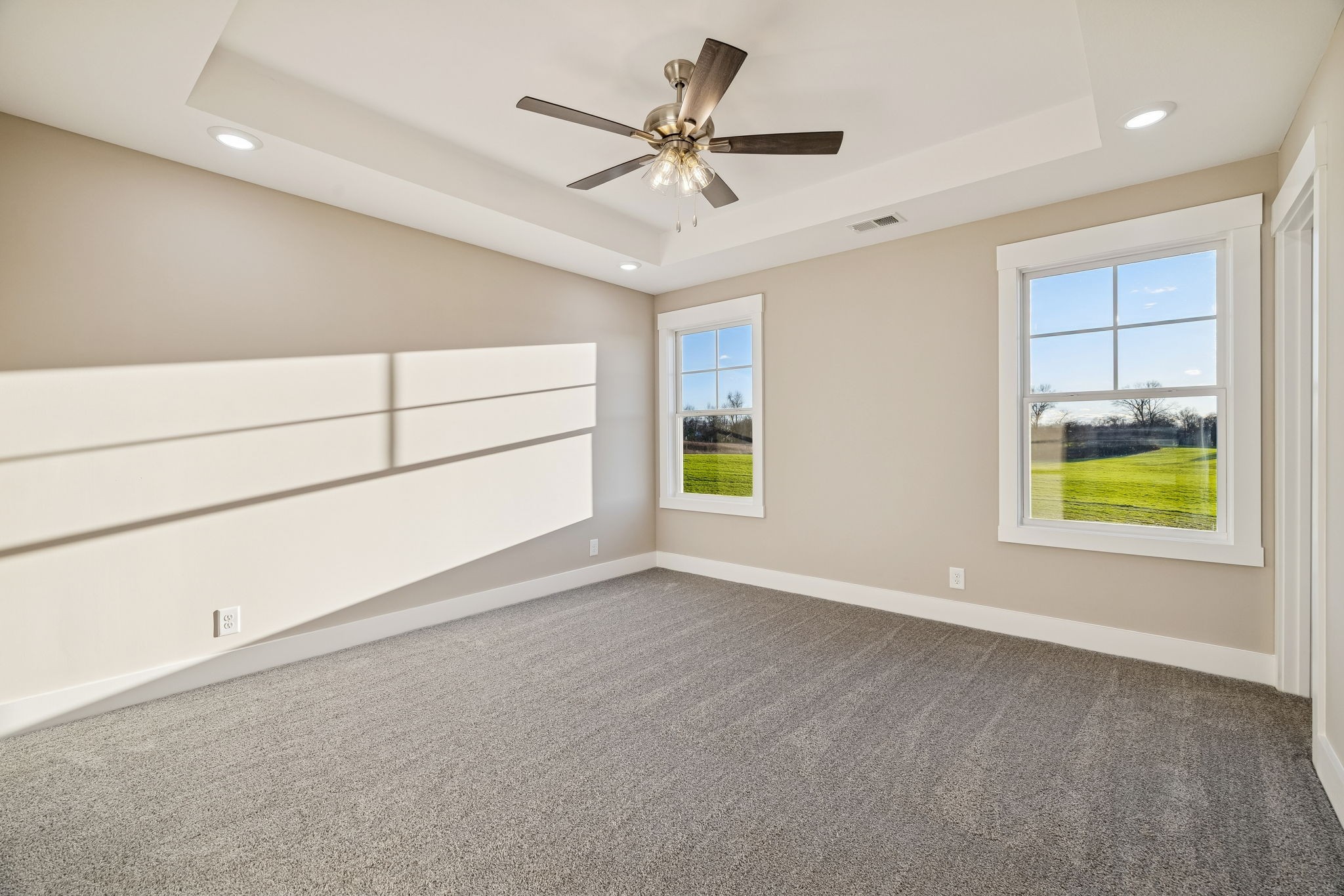 357 Hugh Hunter Road Oak Grove, KY 42262 - Photo 17 of 43 an empty room with windows and closet
