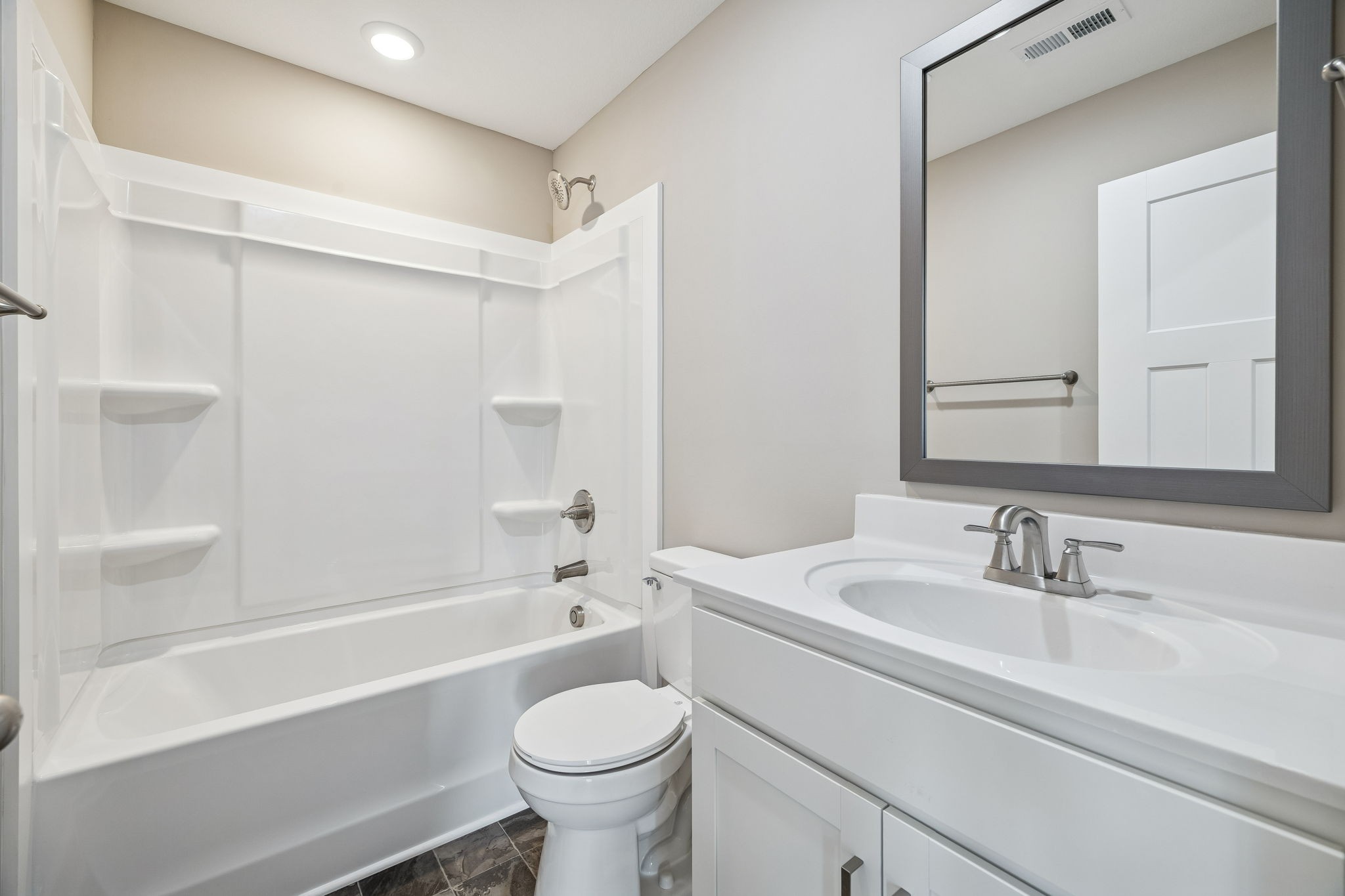 357 Hugh Hunter Road Oak Grove, KY 42262 - Photo 22 of 43 a bathroom with a sink toilet and shower