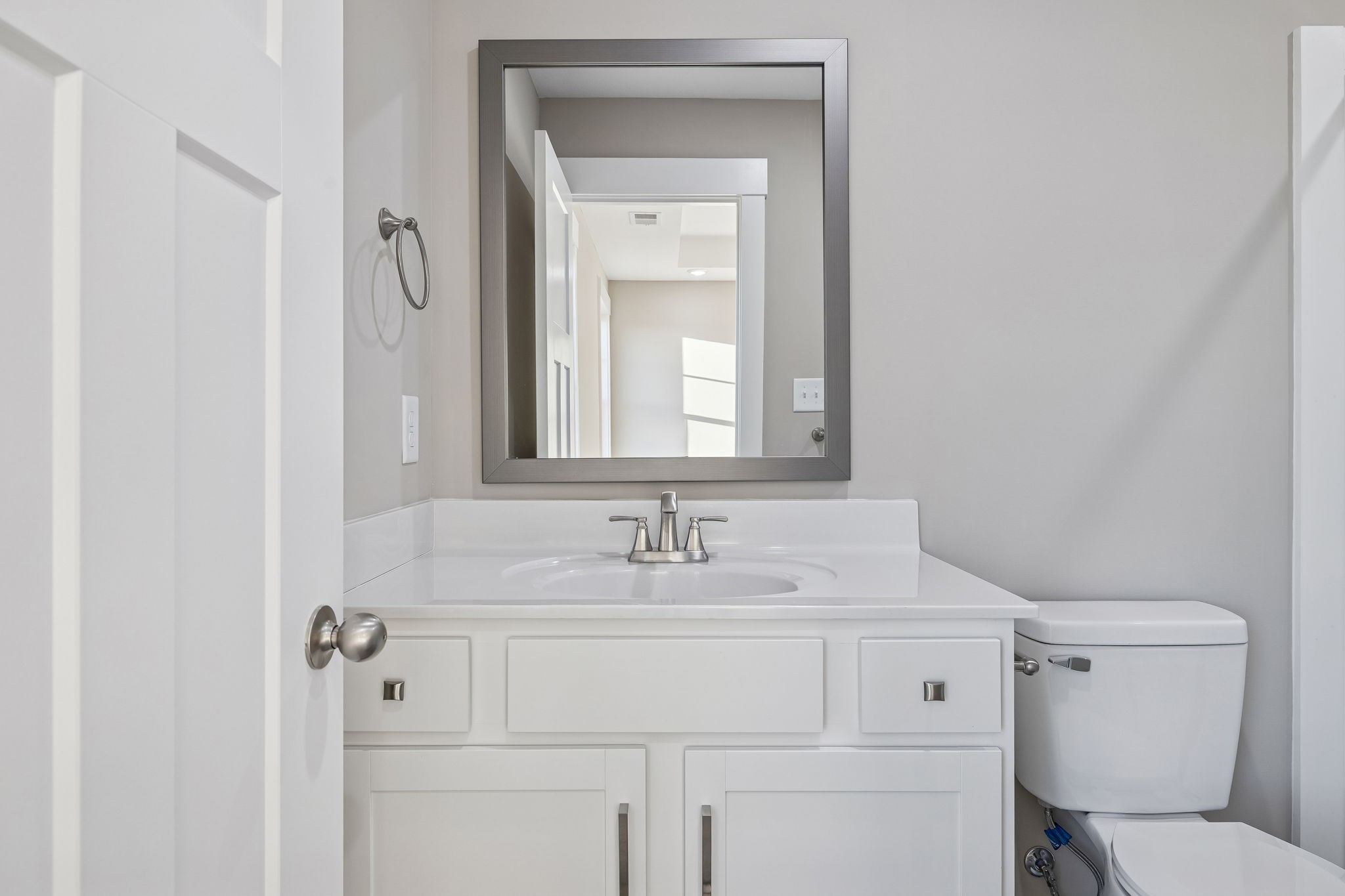 357 Hugh Hunter Road Oak Grove, KY 42262 - Photo 28 of 43 a bathroom with a sink toilet vanity and mirror