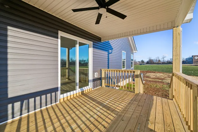 a view of a balcony with wooden floor