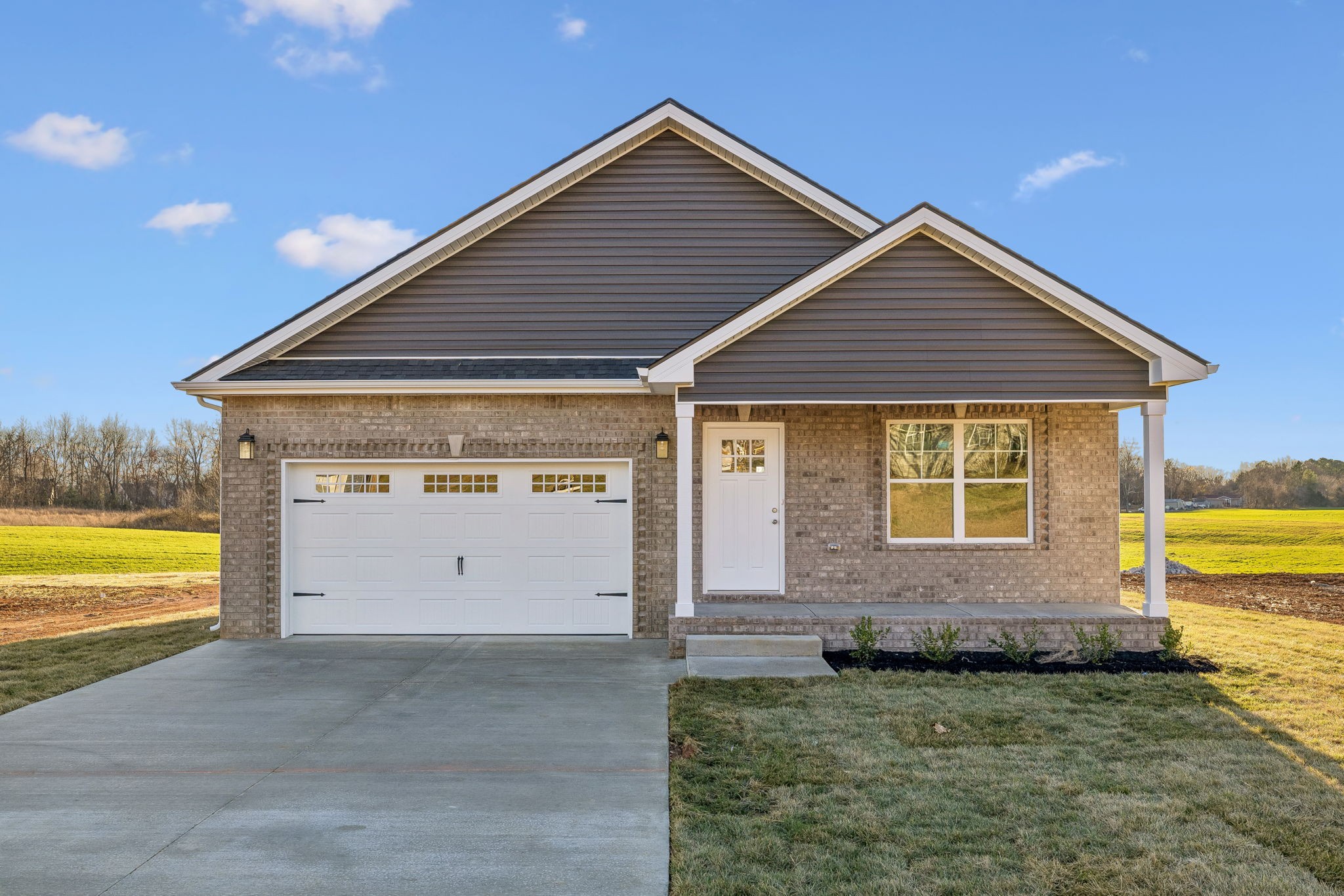 357 Hugh Hunter Road Oak Grove, KY 42262 - Photo 42 of 43 a view of a house with backyard and garden