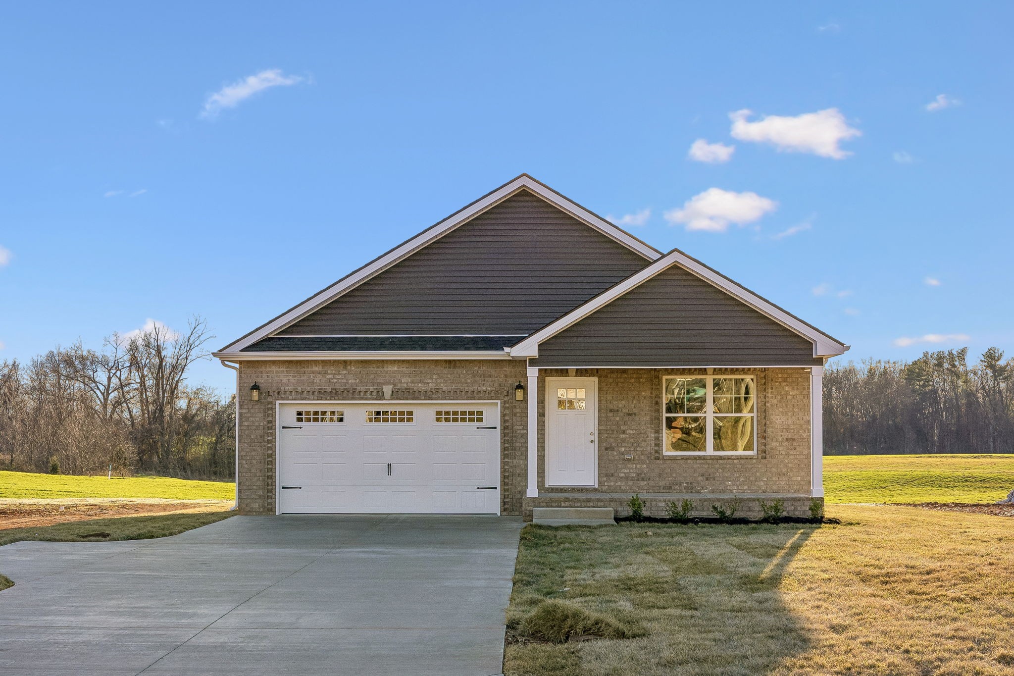 357 Hugh Hunter Road Oak Grove, KY 42262 - Photo 5 of 43 a front view of a house with a yard