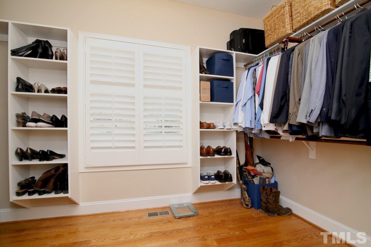 502 Shelley Road Raleigh, NC 27609 - Photo 13 of 25 a view of walk in closet with clothes and shoes