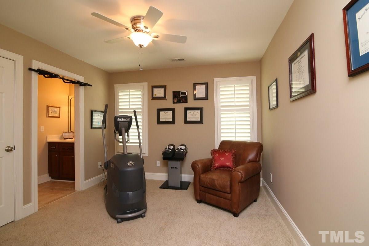 502 Shelley Road Raleigh, NC 27609 - Photo 18 of 25 a living room with furniture and a window