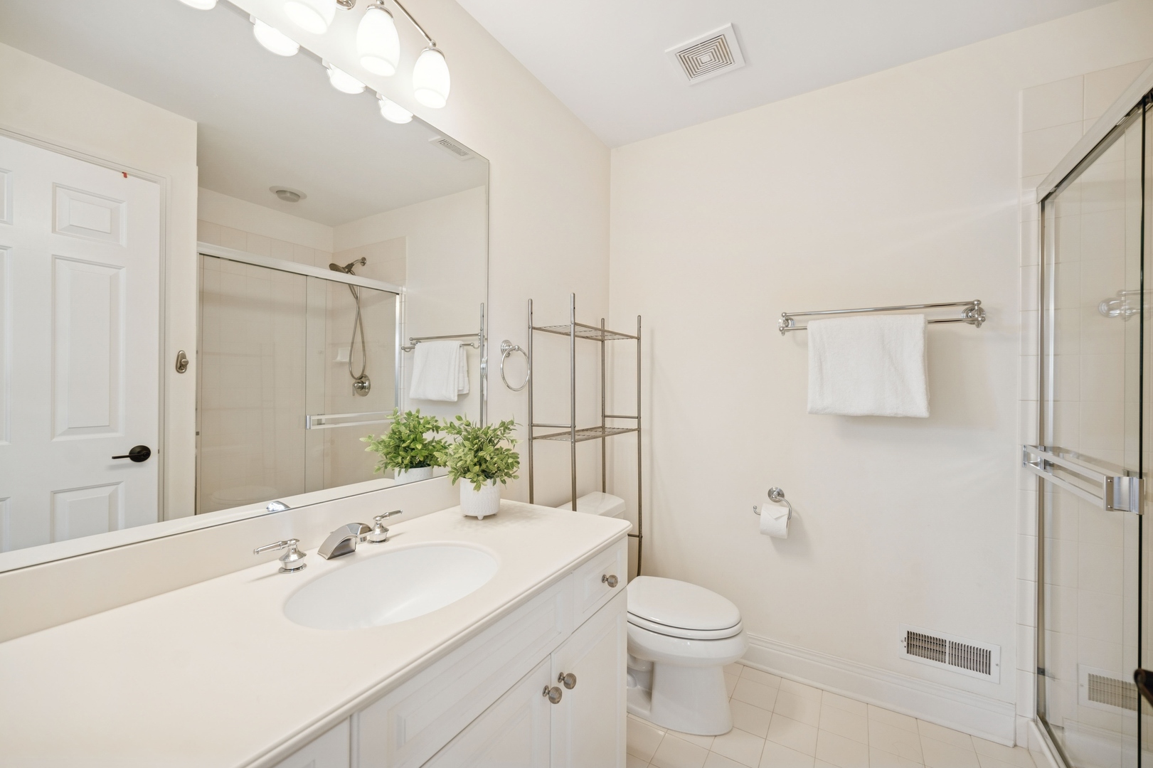 1437 Kittyhawk Lane Glenview, IL 60026 - Photo 15 of 24 a bathroom with a sink toilet and shower