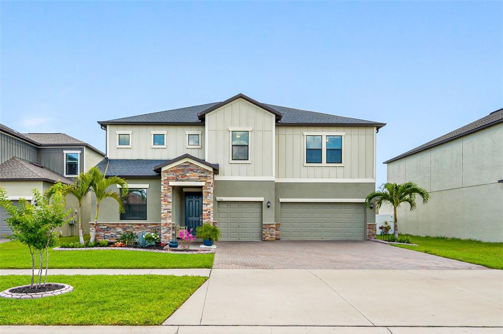 13506 White Sapphire Road Riverview, FL 33579 - Photo 1 of 1 a front view of house with yard and green space