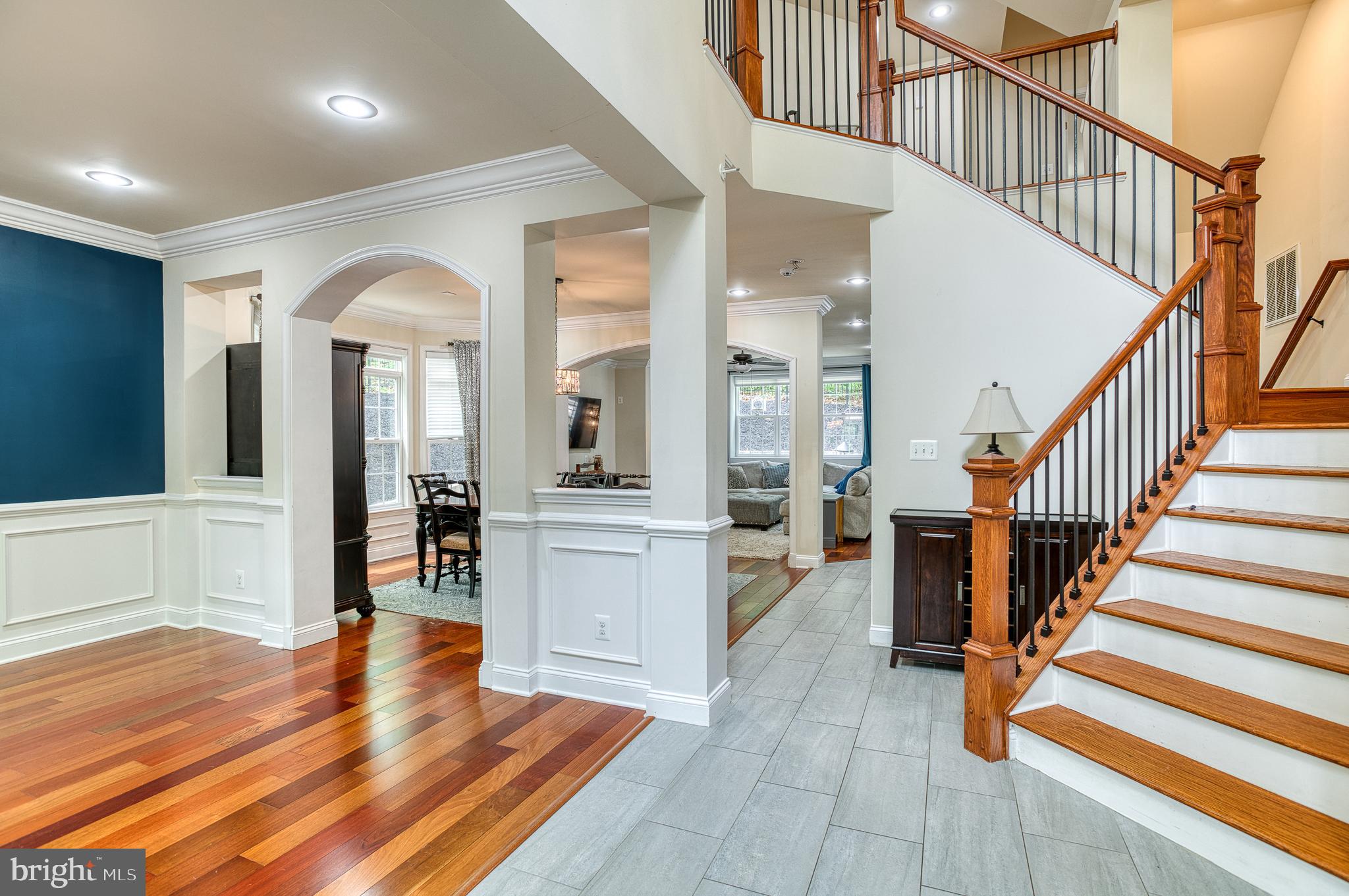 7140 Barry Road Alexandria, VA 22315 - Photo 22 of 56 a view of entryway and hall with wooden floor