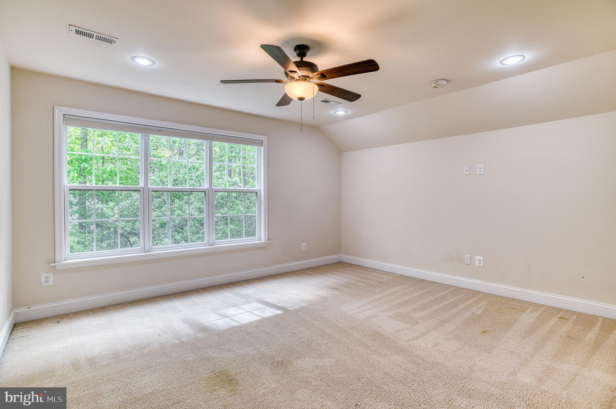 7140 Barry Road Alexandria, VA 22315 - Photo 39 of 56 a view of an empty room with a window