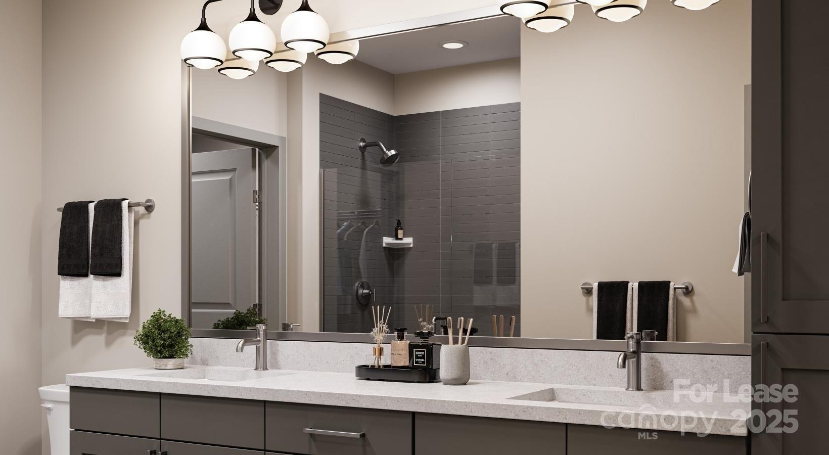 9414 Mallard Creek Road, Unit ALEXANDER Charlotte, NC 28262 - Photo 11 of 13 a bathroom with a sink a light fixture and a mirror
