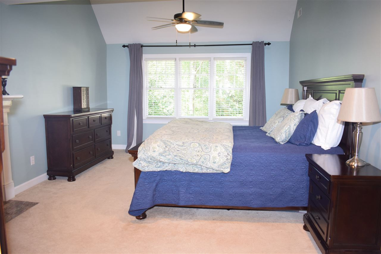 1605 Dressage Court Raleigh, NC 27613 - Photo 9 of 21 Master bedroom w/ gas log fireplace, walk-in closet, ceiling fan & loft. Master Bedroom