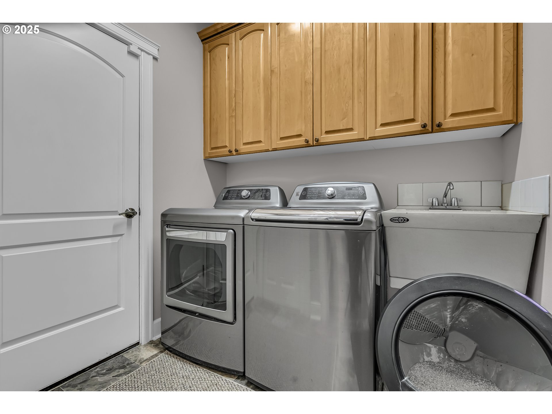 6336 Nicklaus Loop North Keizer, OR 97303 - Photo 19 of 45 a utility room with dryer and washer