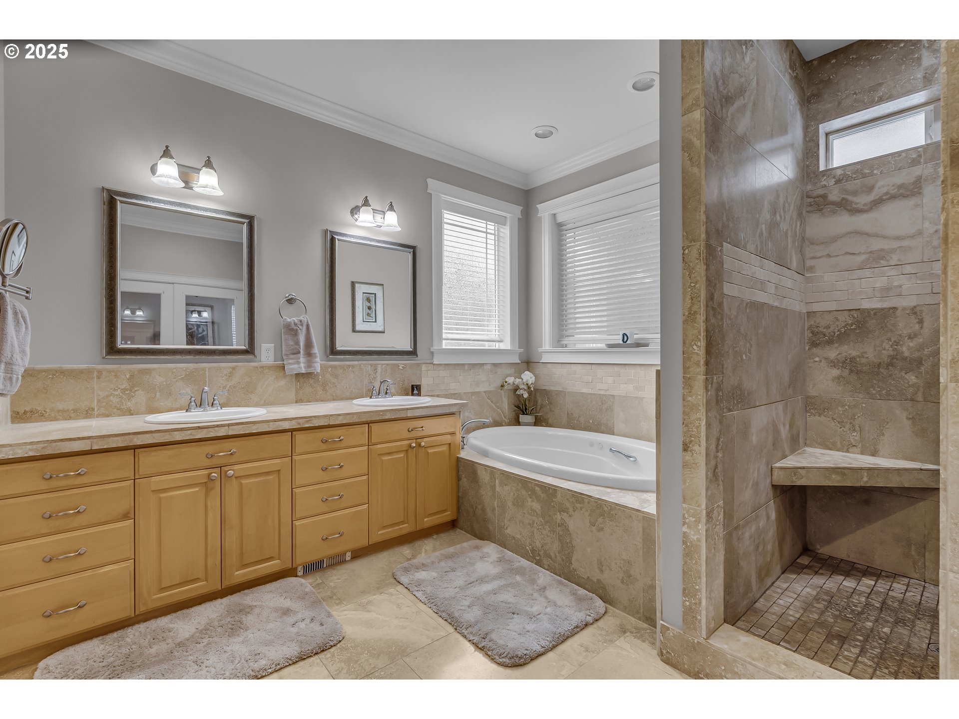 6336 Nicklaus Loop North Keizer, OR 97303 - Photo 23 of 45 a spacious bathroom with a tub sink shower and mirror