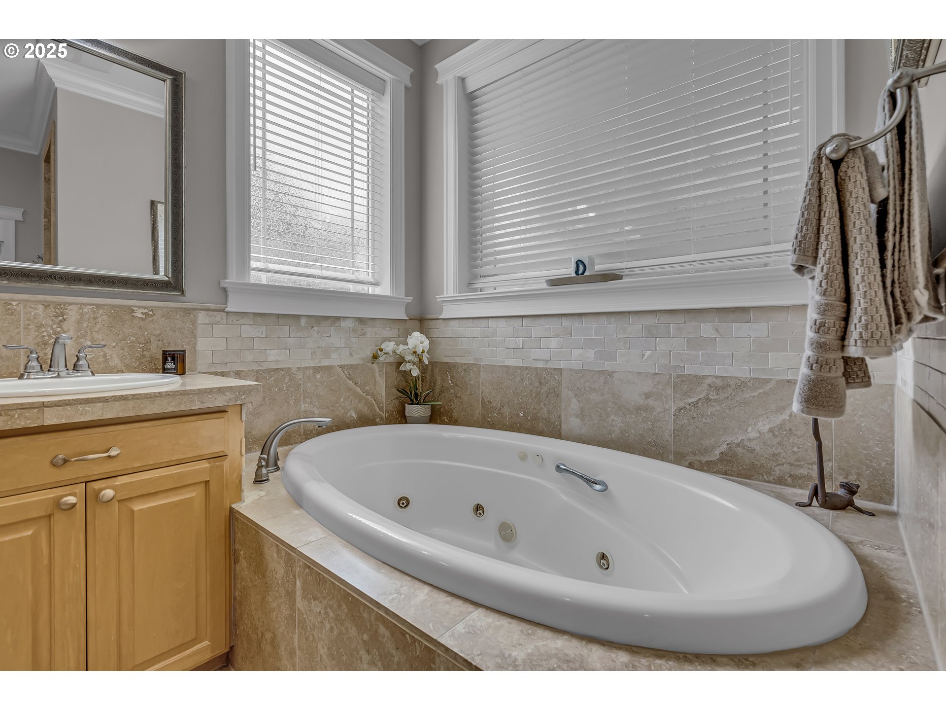 6336 Nicklaus Loop North Keizer, OR 97303 - Photo 24 of 45 a bathroom with a sink and a bathtub