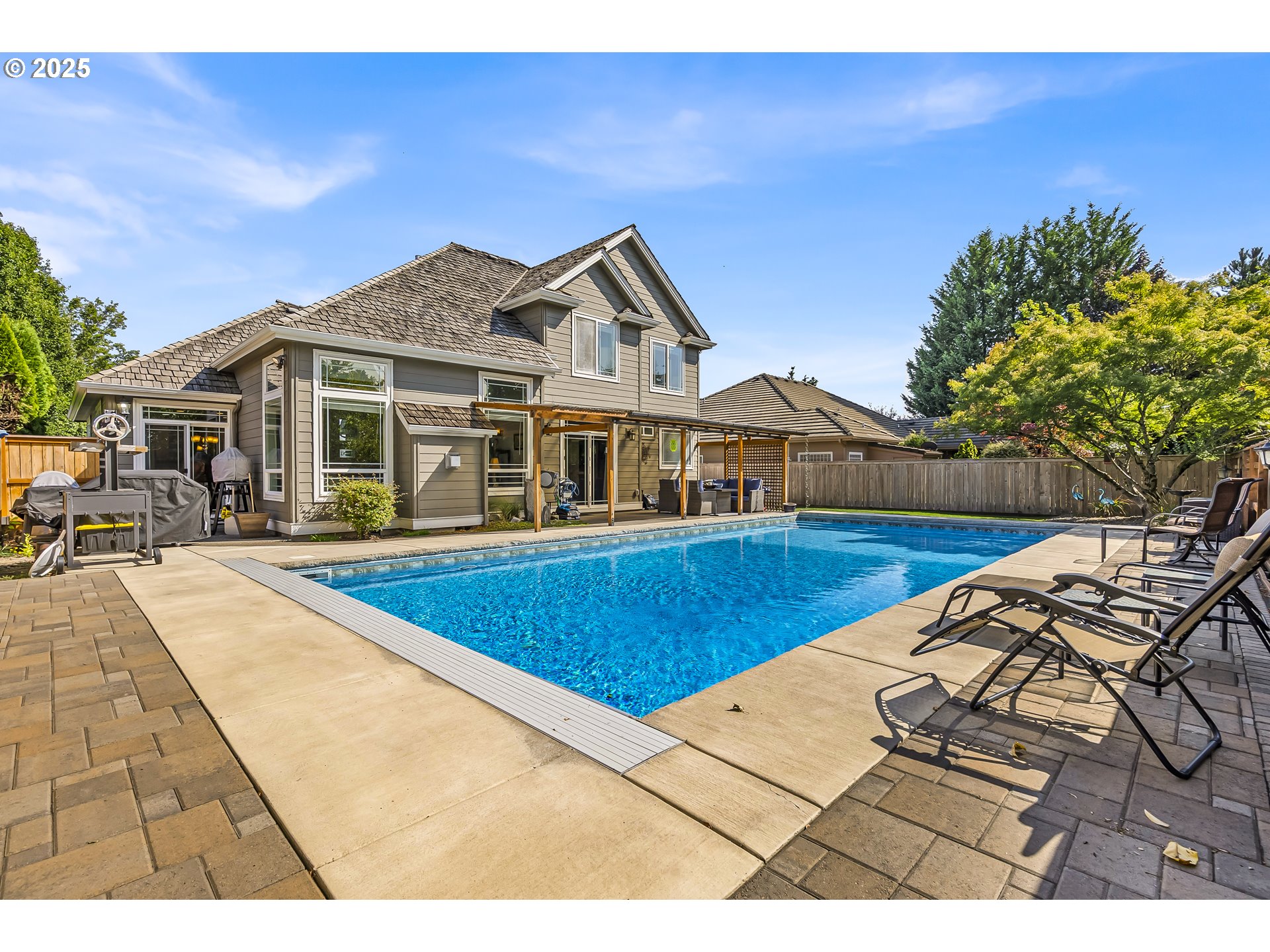 6336 Nicklaus Loop North Keizer, OR 97303 - Photo 37 of 45 a view of a house with a swimming pool