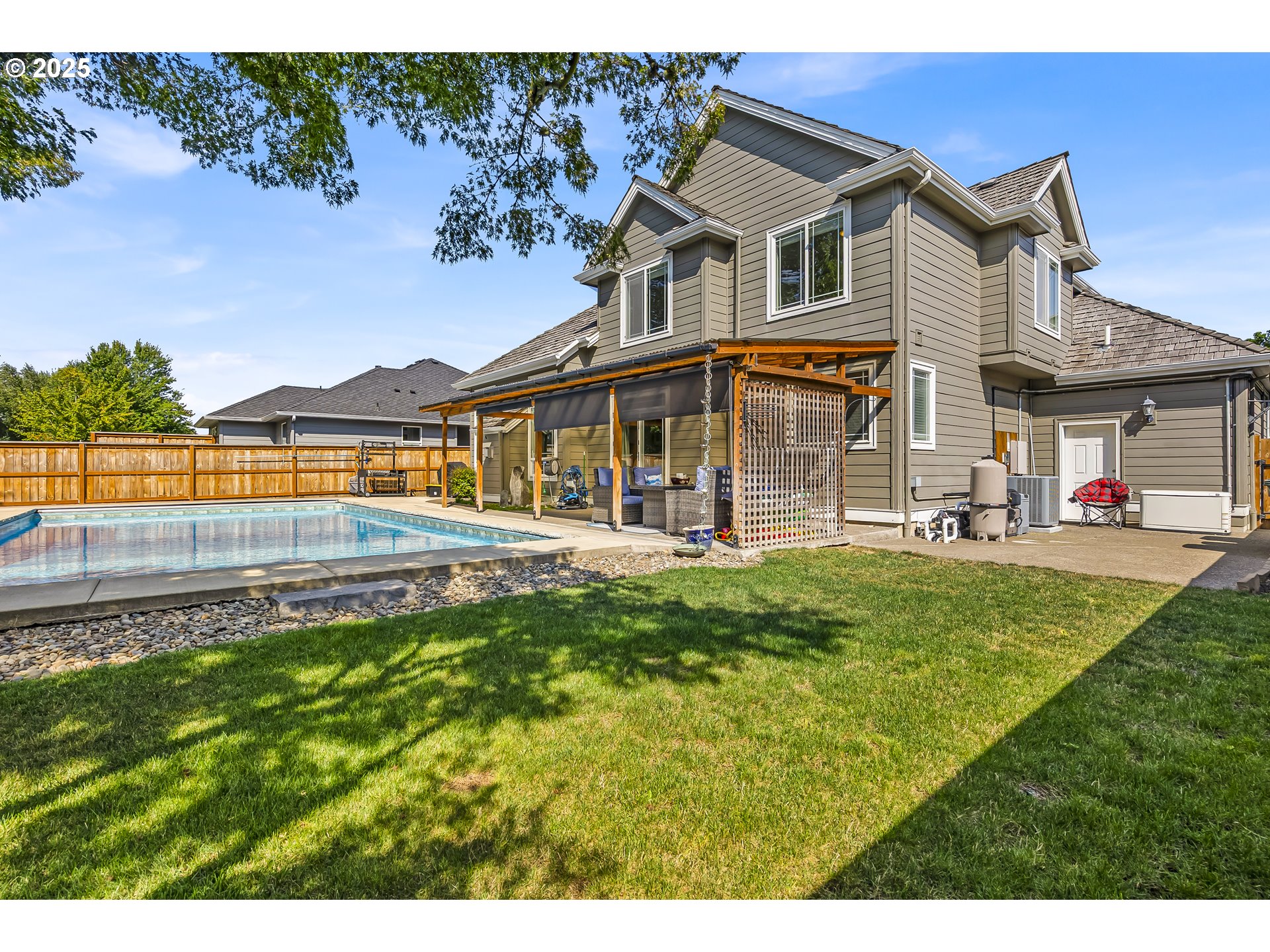 6336 Nicklaus Loop North Keizer, OR 97303 - Photo 41 of 45 a front view of a house with a yard table and chairs