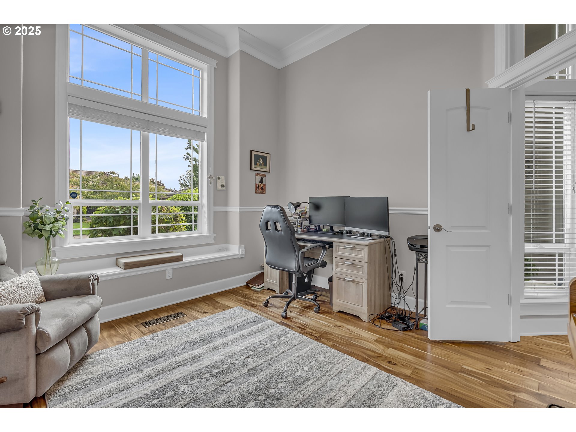 6336 Nicklaus Loop North Keizer, OR 97303 - Photo 7 of 45 a view of a workspace with furniture and a window